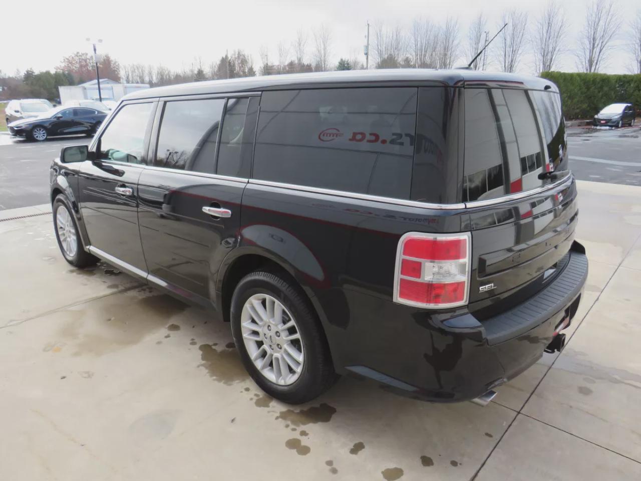 2018 Ford Flex SEL (**SAFETY/CERTIFIED!!**CLEAN TITLE/NO ACCIDENTS!!**7 PASSENGER**STOW AND GO SEATING**AWD**FOG LIGHTS**TINTS**ALLOY RIMS**NAVIGATION**LEATHER**HEATED SEATS**DUAL CLIMATE CONTROL**POWER SEATS**SUNROOF**DIGITAL TOUCHSCREEN**POWER TAILGATE**BLUETOOTH**CRU Photo2