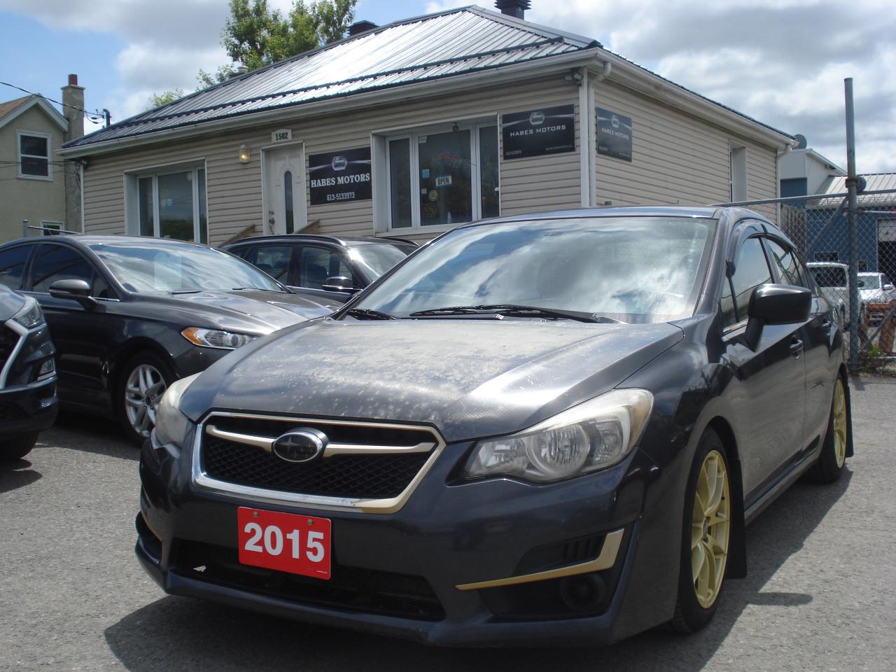 2015 Subaru Impreza 4dr Sdn Man 2.0i w/Limited Pkg Photo0
