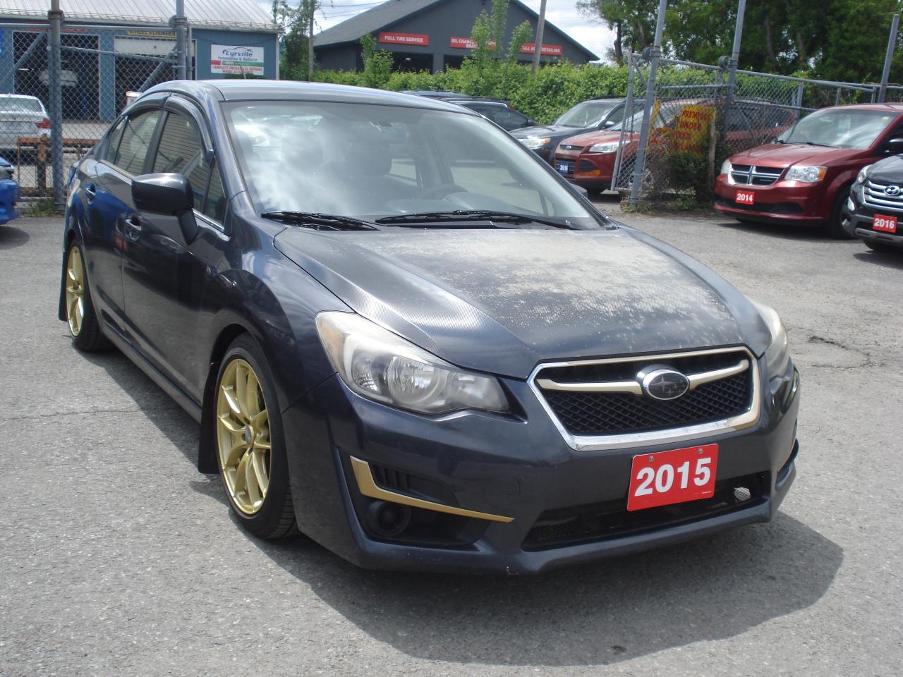 2015 Subaru Impreza 4dr Sdn Man 2.0i w/Limited Pkg Photo