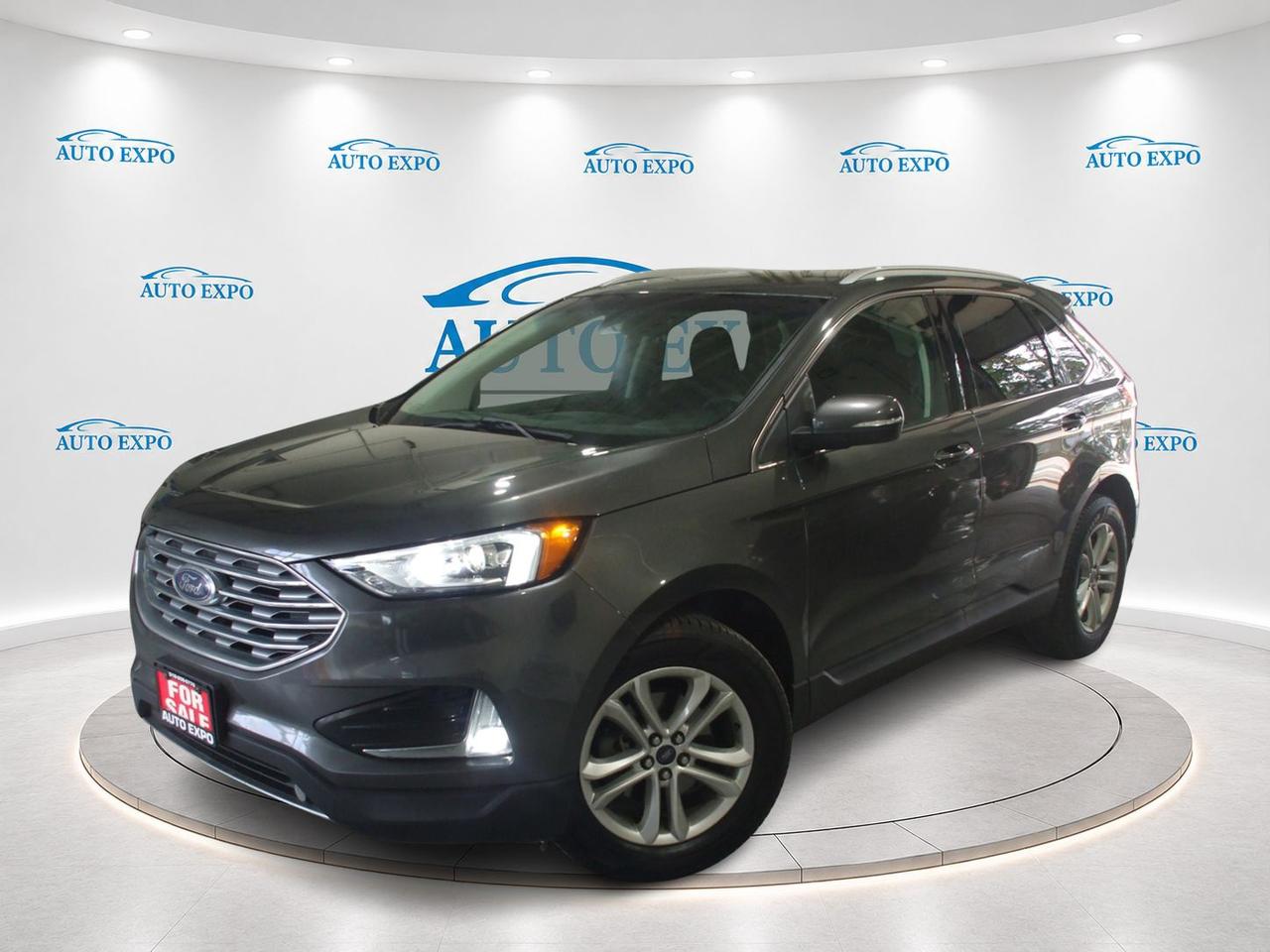 <p>Looking for a reliable and stylish SUV? Check out this pre-owned 2019 Ford Edge SEL, available now at Auto Expo Inc.! This versatile crossover is ready for your next adventure, boasting a sleek grey exterior and a comfortable black interior. With only 112,000km on the odometer, this Edge is just getting started. This Ford Edge SEL offers the perfect blend of practicality and modern features, making it ideal for families, commuters, or anyone who appreciates a well-equipped vehicle.</p><p>This Ford Edge SEL comes loaded with features designed to elevate your driving experience. The Certified designation ensures peace of mind, knowing this vehicle has been thoroughly inspected and meets our high standards. Enjoy added confidence with a Clean Carfax report, providing a detailed history of the vehicle.</p><p>Here are five of the best features:</p><ul><li><strong>Heated Seats</strong>: Experience ultimate comfort, especially on those chilly Canadian mornings.</li><li><strong>Alloys</strong>: Enhance the Edges sporty look and improve performance.</li><li><strong>Fog Lights</strong>: Drive with confidence and improved visibility, no matter the weather.</li><li><strong>Clean Carfax:</strong> Get peace of mind with a detailed history of the vehicle.</li><li><strong>Certified</strong>: Know that this vehicle has been thoroughly inspected.</li></ul><p>Visit Auto Expo Inc. today and experience the 2019 Ford Edge SEL for yourself!</p><p><strong><em>Powered by AutoIntelligence&trade;</em></strong> Vehicle information has been generated using artificial intelligence and is provided for informational purposes only. While efforts are made to ensure accuracy, please confirm all details directly with the dealer.</p><ol style=border: 0px solid #e5e7eb; box-sizing: border-box; --tw-border-spacing-x: 0; --tw-border-spacing-y: 0; --tw-translate-x: 0; --tw-translate-y: 0; --tw-rotate: 0; --tw-skew-x: 0; --tw-skew-y: 0; --tw-scale-x: 1; --tw-scale-y: 1; --tw-scroll-snap-strictness: proximity; --tw-ring-offset-width: 0px; --tw-ring-offset-color: #fff; --tw-ring-color: rgba(59,130,246,.5); --tw-ring-offset-shadow: 0 0 #0000; --tw-ring-shadow: 0 0 #0000; --tw-shadow: 0 0 #0000; --tw-shadow-colored: 0 0 #0000; list-style: none; margin: 0px; padding: 0px; font-family: Inter, sans-serif;><li style=border: 0px solid #e5e7eb; box-sizing: border-box; --tw-border-spacing-x: 0; --tw-border-spacing-y: 0; --tw-translate-x: 0; --tw-translate-y: 0; --tw-rotate: 0; --tw-skew-x: 0; --tw-skew-y: 0; --tw-scale-x: 1; --tw-scale-y: 1; --tw-scroll-snap-strictness: proximity; --tw-ring-offset-width: 0px; --tw-ring-offset-color: #fff; --tw-ring-color: rgba(59,130,246,.5); --tw-ring-offset-shadow: 0 0 #0000; --tw-ring-shadow: 0 0 #0000; --tw-shadow: 0 0 #0000; --tw-shadow-colored: 0 0 #0000;><em style=border: 0px solid #e5e7eb; box-sizing: border-box; --tw-border-spacing-x: 0; --tw-border-spacing-y: 0; --tw-translate-x: 0; --tw-translate-y: 0; --tw-rotate: 0; --tw-skew-x: 0; --tw-skew-y: 0; --tw-scale-x: 1; --tw-scale-y: 1; --tw-scroll-snap-strictness: proximity; --tw-ring-offset-width: 0px; --tw-ring-offset-color: #fff; --tw-ring-color: rgba(59,130,246,.5); --tw-ring-offset-shadow: 0 0 #0000; --tw-ring-shadow: 0 0 #0000; --tw-shadow: 0 0 #0000; --tw-shadow-colored: 0 0 #0000; font-size: 18pt;><span style=border: 0px solid #e5e7eb; box-sizing: border-box; --tw-border-spacing-x: 0; --tw-border-spacing-y: 0; --tw-translate-x: 0; --tw-translate-y: 0; --tw-rotate: 0; --tw-skew-x: 0; --tw-skew-y: 0; --tw-scale-x: 1; --tw-scale-y: 1; --tw-scroll-snap-strictness: proximity; --tw-ring-offset-width: 0px; --tw-ring-offset-color: #fff; --tw-ring-color: rgba(59,130,246,.5); --tw-ring-offset-shadow: 0 0 #0000; --tw-ring-shadow: 0 0 #0000; --tw-shadow: 0 0 #0000; --tw-shadow-colored: 0 0 #0000; font-weight: bolder;>We finance,,,</span></em></li></ol><p style=border: 0px solid #e5e7eb; box-sizing: border-box; --tw-border-spacing-x: 0; --tw-border-spacing-y: 0; --tw-translate-x: 0; --tw-translate-y: 0; --tw-rotate: 0; --tw-skew-x: 0; --tw-skew-y: 0; --tw-scale-x: 1; --tw-scale-y: 1; --tw-scroll-snap-strictness: proximity; --tw-ring-offset-width: 0px; --tw-ring-offset-color: #fff; --tw-ring-color: rgba(59,130,246,.5); --tw-ring-offset-shadow: 0 0 #0000; --tw-ring-shadow: 0 0 #0000; --tw-shadow: 0 0 #0000; --tw-shadow-colored: 0 0 #0000; margin: 0px; font-family: Inter, sans-serif;><a style=border: 0px solid #e5e7eb; box-sizing: border-box; --tw-border-spacing-x: 0; --tw-border-spacing-y: 0; --tw-translate-x: 0; --tw-translate-y: 0; --tw-rotate: 0; --tw-skew-x: 0; --tw-skew-y: 0; --tw-scale-x: 1; --tw-scale-y: 1; --tw-scroll-snap-strictness: proximity; --tw-ring-offset-width: 0px; --tw-ring-offset-color: #fff; --tw-ring-color: rgba(59,130,246,.5); --tw-ring-offset-shadow: 0 0 #0000; --tw-ring-shadow: 0 0 #0000; --tw-shadow: 0 0 #0000; --tw-shadow-colored: 0 0 #0000; text-decoration: inherit; href=https://vhr.carfax.ca/?id=UtCpj4VLd4jLufa8QUJSSLC6AKr6GFb/&_jstate=PxI2DHNk_lIvHhXVe3VIQT8SNgxzZP5SLx4V1Xt1SEH5cvzCF-VBt_xVS-ui8_TFlnsEURpiwNGaVVxzWFaGADcNcJQZU8At7nIjHz-5jAlg3DperideEvzTQStTs9eRx_SMjktlF2JTsu2Eyo8NxM0BPt5THpIq5SaWrwYVBmLZq5NYvkiwA1de4QDxVTffSdhfCeCX-jJZxPZEN8YHrRWXUfV-28IA7WtbWuQSQc-oKHNjlF7pIWo-rJdf_j2V859AHPaUBvKgVf8DbgLHBf3lGTiTCltWbyR9-qzi-YGZu-40auMEehJJNmrRczs_pe0H3oVsVvJQI7Q-yZm0w8UjyVa2ZpNxvjO1A0_wSBndadM9g3svK1EwygD4H9DbfPQUchKkgFKB7sZGyNCf-DNG1G2Zk4a-GT5zu0s0vIBN8cTWCLXWjEMk8Ua2m486 target=_blank rel=noopener><span style=border: 0px solid #e5e7eb; box-sizing: border-box; --tw-border-spacing-x: 0; --tw-border-spacing-y: 0; --tw-translate-x: 0; --tw-translate-y: 0; --tw-rotate: 0; --tw-skew-x: 0; --tw-skew-y: 0; --tw-scale-x: 1; --tw-scale-y: 1; --tw-scroll-snap-strictness: proximity; --tw-ring-offset-width: 0px; --tw-ring-offset-color: #fff; --tw-ring-color: rgba(59,130,246,.5); --tw-ring-offset-shadow: 0 0 #0000; --tw-ring-shadow: 0 0 #0000; --tw-shadow: 0 0 #0000; --tw-shadow-colored: 0 0 #0000; font-weight: bolder; font-size: 18px; color: #333333;>OMVIC Licensed, UCDA & Carfax Member,,,</span></a></p><p style=border: 0px solid #e5e7eb; box-sizing: border-box; --tw-border-spacing-x: 0; --tw-border-spacing-y: 0; --tw-translate-x: 0; --tw-translate-y: 0; --tw-rotate: 0; --tw-skew-x: 0; --tw-skew-y: 0; --tw-scale-x: 1; --tw-scale-y: 1; --tw-scroll-snap-strictness: proximity; --tw-ring-offset-width: 0px; --tw-ring-offset-color: #fff; --tw-ring-color: rgba(59,130,246,.5); --tw-ring-offset-shadow: 0 0 #0000; --tw-ring-shadow: 0 0 #0000; --tw-shadow: 0 0 #0000; --tw-shadow-colored: 0 0 #0000; margin: 0px; font-family: Inter, sans-serif;><span style=border: 0px solid #e5e7eb; box-sizing: border-box; --tw-border-spacing-x: 0; --tw-border-spacing-y: 0; --tw-translate-x: 0; --tw-translate-y: 0; --tw-rotate: 0; --tw-skew-x: 0; --tw-skew-y: 0; --tw-scale-x: 1; --tw-scale-y: 1; --tw-scroll-snap-strictness: proximity; --tw-ring-offset-width: 0px; --tw-ring-offset-color: #fff; --tw-ring-color: rgba(59,130,246,.5); --tw-ring-offset-shadow: 0 0 #0000; --tw-ring-shadow: 0 0 #0000; --tw-shadow: 0 0 #0000; --tw-shadow-colored: 0 0 #0000; text-decoration-line: underline; font-size: 18pt;><em style=border: 0px solid #e5e7eb; box-sizing: border-box; --tw-border-spacing-x: 0; --tw-border-spacing-y: 0; --tw-translate-x: 0; --tw-translate-y: 0; --tw-rotate: 0; --tw-skew-x: 0; --tw-skew-y: 0; --tw-scale-x: 1; --tw-scale-y: 1; --tw-scroll-snap-strictness: proximity; --tw-ring-offset-width: 0px; --tw-ring-offset-color: #fff; --tw-ring-color: rgba(59,130,246,.5); --tw-ring-offset-shadow: 0 0 #0000; --tw-ring-shadow: 0 0 #0000; --tw-shadow: 0 0 #0000; --tw-shadow-colored: 0 0 #0000;><span style=border: 0px solid #e5e7eb; box-sizing: border-box; --tw-border-spacing-x: 0; --tw-border-spacing-y: 0; --tw-translate-x: 0; --tw-translate-y: 0; --tw-rotate: 0; --tw-skew-x: 0; --tw-skew-y: 0; --tw-scale-x: 1; --tw-scale-y: 1; --tw-scroll-snap-strictness: proximity; --tw-ring-offset-width: 0px; --tw-ring-offset-color: #fff; --tw-ring-color: rgba(59,130,246,.5); --tw-ring-offset-shadow: 0 0 #0000; --tw-ring-shadow: 0 0 #0000; --tw-shadow: 0 0 #0000; --tw-shadow-colored: 0 0 #0000; font-weight: bolder;>we specialize in Domestic and import vehicles! Our wide selection offers something for every need and budget!</span></em></span></p><p style=border: 0px solid #e5e7eb; box-sizing: border-box; --tw-border-spacing-x: 0; --tw-border-spacing-y: 0; --tw-translate-x: 0; --tw-translate-y: 0; --tw-rotate: 0; --tw-skew-x: 0; --tw-skew-y: 0; --tw-scale-x: 1; --tw-scale-y: 1; --tw-scroll-snap-strictness: proximity; --tw-ring-offset-width: 0px; --tw-ring-offset-color: #fff; --tw-ring-color: rgba(59,130,246,.5); --tw-ring-offset-shadow: 0 0 #0000; --tw-ring-shadow: 0 0 #0000; --tw-shadow: 0 0 #0000; --tw-shadow-colored: 0 0 #0000; margin: 0px; font-family: Inter, sans-serif;><span style=border: 0px solid #e5e7eb; box-sizing: border-box; --tw-border-spacing-x: 0; --tw-border-spacing-y: 0; --tw-translate-x: 0; --tw-translate-y: 0; --tw-rotate: 0; --tw-skew-x: 0; --tw-skew-y: 0; --tw-scale-x: 1; --tw-scale-y: 1; --tw-scroll-snap-strictness: proximity; --tw-ring-offset-width: 0px; --tw-ring-offset-color: #fff; --tw-ring-color: rgba(59,130,246,.5); --tw-ring-offset-shadow: 0 0 #0000; --tw-ring-shadow: 0 0 #0000; --tw-shadow: 0 0 #0000; --tw-shadow-colored: 0 0 #0000; text-decoration-line: underline; font-size: 18pt;><em style=border: 0px solid #e5e7eb; box-sizing: border-box; --tw-border-spacing-x: 0; --tw-border-spacing-y: 0; --tw-translate-x: 0; --tw-translate-y: 0; --tw-rotate: 0; --tw-skew-x: 0; --tw-skew-y: 0; --tw-scale-x: 1; --tw-scale-y: 1; --tw-scroll-snap-strictness: proximity; --tw-ring-offset-width: 0px; --tw-ring-offset-color: #fff; --tw-ring-color: rgba(59,130,246,.5); --tw-ring-offset-shadow: 0 0 #0000; --tw-ring-shadow: 0 0 #0000; --tw-shadow: 0 0 #0000; --tw-shadow-colored: 0 0 #0000;><span style=border: 0px solid #e5e7eb; box-sizing: border-box; --tw-border-spacing-x: 0; --tw-border-spacing-y: 0; --tw-translate-x: 0; --tw-translate-y: 0; --tw-rotate: 0; --tw-skew-x: 0; --tw-skew-y: 0; --tw-scale-x: 1; --tw-scale-y: 1; --tw-scroll-snap-strictness: proximity; --tw-ring-offset-width: 0px; --tw-ring-offset-color: #fff; --tw-ring-color: rgba(59,130,246,.5); --tw-ring-offset-shadow: 0 0 #0000; --tw-ring-shadow: 0 0 #0000; --tw-shadow: 0 0 #0000; --tw-shadow-colored: 0 0 #0000; font-weight: bolder;>Visit us @ 450 Belmont Ave, West Kitchener!</span></em></span></p>