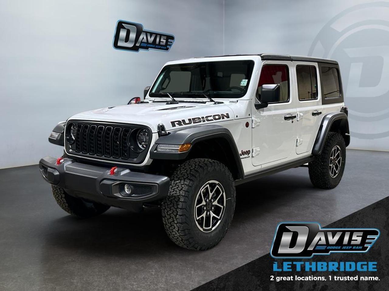 <b>Off-Road Suspension, Adaptive Cruise Control, Heated Seats and Wheel, Collision Mitigation, Powered Front Seats!<br /> <br /></b><br /> <br /> <br />This 2026 Jeep Wrangler Rubicon delivers true off-road performance with its 3.6L Pentastar V6, 8-speed automatic, Rock-Trac 4x4, front and rear locking differentials, electronic sway bar disconnect, and 33-inch all-terrain tires. The Rubicons raised suspension, heavy-duty axles, and skid plates make it trail-ready from day one.<br /><br />Inside, enjoy Uconnect with Apple CarPlay/Android Auto, premium Rubicon interior accents, push-button start, and a wash-out interior designed for adventure. Standard safety includes a backup camera, traction and stability control, and hill-start assist.<br /><br />A rugged, trail-focused Wrangler with unbeatable capability  perfect for off-road enthusiasts and year-round adventure.<br /> <br />To apply right now for financing use this link: <a href=https://lethbridge.davisdodge.ca/free-credit-check/ target=_blank rel=nofollow noopener noreferrer>https://lethbridge.davisdodge.ca/free-credit-check/</a><br /><br /> <br /><br />As a premier Chrysler, Dodge, Jeep and RAM dealership, Davis Dodge proudly offers an extensive selection of new and used vehicles to meet every drivers needs. Customers across Lethbridge, Fort Macleod, Taber, Claresholm, Coaldale, and beyond trust us for daily vehicle specials, certified service and parts, and a seamless online inventory experience. <br /><br /> With competitive financing options and expert support, we make car buying easy and enjoyable. <br /><br /> Ready to hit the road? Schedule your test drive today at Davis Dodge, your trusted Chrysler, Dodge, Jeep and RAM dealer in Lethbridge, Alberta.<br /><br /> Vehicle pricing offer shown expires 2026-04-30. <br /> Come by and check out our fleet of 70+ used cars and trucks and 110+ new cars and trucks for sale in Lethbridge. o~o