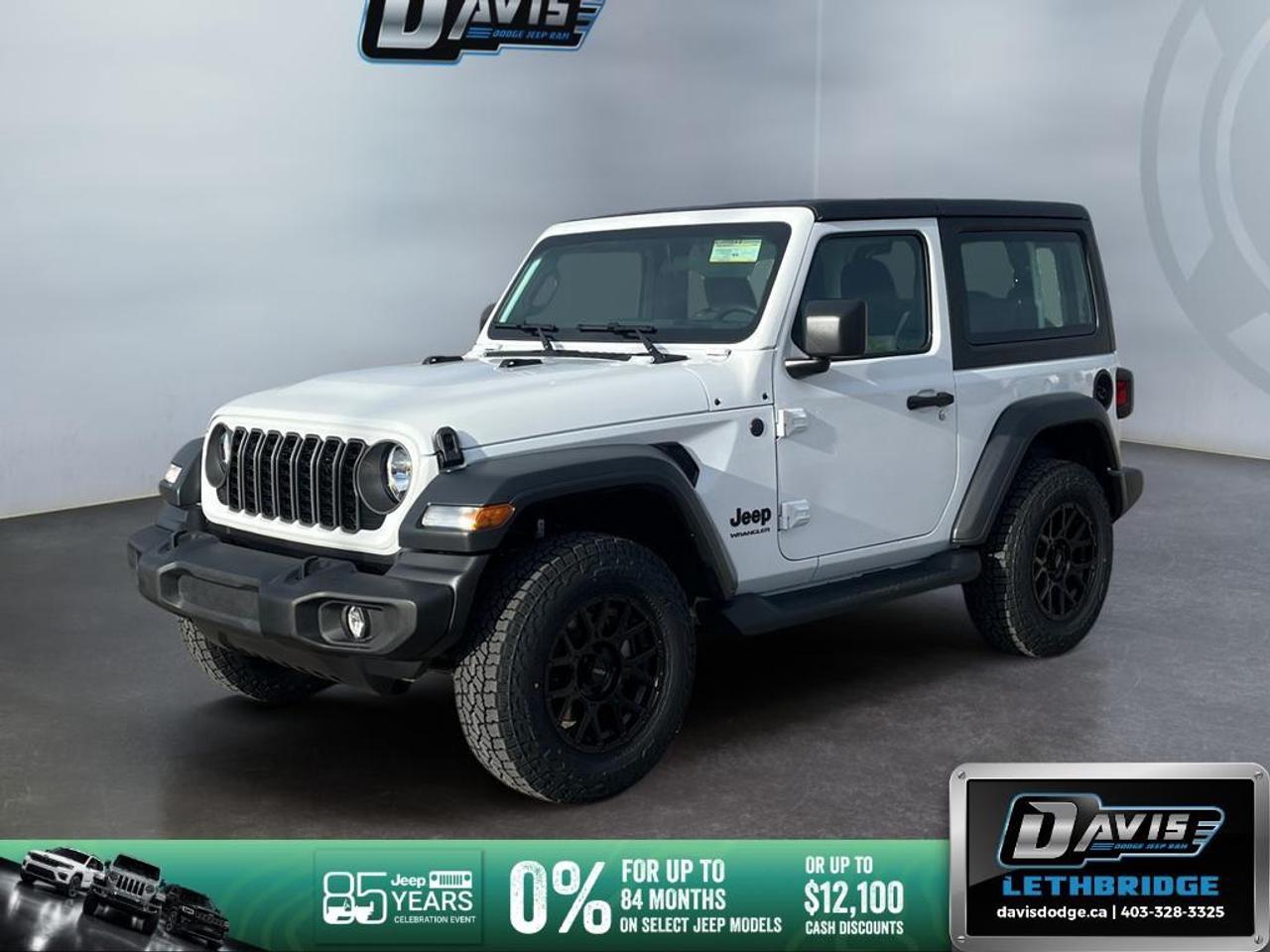 <p>Introducing the 2026 Jeep Wrangler Sport 2 Door 4x4 in a striking white finish. With its legendary 4x4 drivetrain, this SUV promises exceptional off-road capability and confident driving on any terrain.</p> <p><strong>Exterior Features</strong></p> <ul><li>Bold white exterior with a durable design</li><li>BLACK FREEDOM TOP 3-PIECE HARDTOP with Freedom Panel Storage Bag</li><li>Rear Window Defroster and Wiper with Washer for added convenience</li></ul> <p><strong>Interior Features</strong></p> <ul><li>Stylish black interior with modern accents</li><li>Apple CarPlay & Android Auto connectivity</li><li>8-speaker audio system for immersive sound</li><li>Air conditioning for comfort in all weather</li><li>Keyless entry and power windows for added ease</li></ul> <p><strong>Technology & Safety Features</strong></p> <ul><li>4G LTE Wifi Hotspot to keep you connected on the go</li><li>Backup camera ensuring safe reversing</li><li>Bluetooth connection and smart device integration</li><li>Comprehensive safety features including brake assist</li></ul> <p>The 2026 Jeep Wrangler Sport is perfect for adventure seekers and outdoor enthusiasts. Experience the thrill of driving this capable 4x4 SUV. Contact Davis Dodge Lethbridge today to learn more and schedule a test drive!</p>