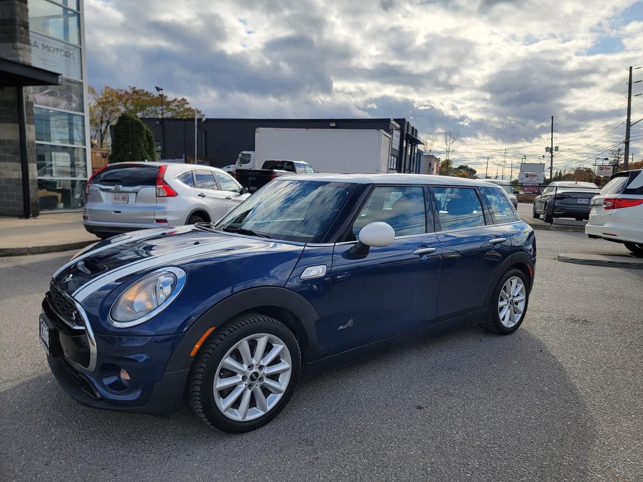 <p data-start=0 data-end=84><strong data-start=0 data-end=82>2018 Mini Cooper Clubman ALL4 &ndash; Premium AWD Compact with Style and Performance</strong></p><p data-start=86 data-end=416>Experience driving excitement and upscale design with this 2018 Mini Cooper Clubman ALL4. A perfect blend of sporty handling, premium craftsmanship, and year-round capability thanks to Mini&rsquo;s advanced ALL4 all-wheel-drive system. This Clubman offers standout style, a refined interior, and the agility that makes every trip fun.</p><p data-start=418 data-end=1127><strong data-start=418 data-end=434>Key Features</strong><br data-start=434 data-end=437>&bull; 1.5L TwinPower Turbo 3-Cylinder Engine<br data-start=477 data-end=480>&bull; 8-Speed Automatic Transmission with Sport and Manual Modes<br data-start=540 data-end=543>&bull; ALL4 All-Wheel Drive System<br data-start=572 data-end=575>&bull; Premium Interior with Ambient Lighting<br data-start=615 data-end=618>&bull; Panoramic Dual Sunroof<br data-start=642 data-end=645>&bull; Heated Front Seats<br data-start=665 data-end=668>&bull; Leather-Wrapped Steering Wheel<br data-start=700 data-end=703>&bull; Dual-Zone Automatic Climate Control<br data-start=740 data-end=743>&bull; Touchscreen Infotainment with Navigation and Bluetooth<br data-start=799 data-end=802>&bull; Apple CarPlay Compatibility<br data-start=831 data-end=834>&bull; Keyless Entry and Push-Button Start<br data-start=871 data-end=874>&bull; Rain-Sensing Wipers<br data-start=895 data-end=898>&bull; Power Folding Mirrors<br data-start=921 data-end=924>&bull; Rear Parking Sensors and Reverse Camera<br data-start=965 data-end=968>&bull; Split Rear Barn Doors for Unique Cargo Access<br data-start=1015 data-end=1018>&bull; 17-Inch Alloy Wheels<br data-start=1040 data-end=1043>&bull; LED Headlights and Daytime Running Lights<br data-start=1086 data-end=1089>&bull; Automatic Headlights and Fog Lamps</p><p data-start=1129 data-end=1415>Local, well-maintained vehicle with a clean Carfax. The ALL4 system delivers exceptional stability in all weather conditions while maintaining Mini&rsquo;s signature go-kart-like handling. Inside, you&rsquo;ll find a surprisingly spacious cabin with premium materials and smart storage solutions.</p><p data-start=1417 data-end=1634 data-is-last-node= data-is-only-node=>A stylish and sporty compact wagon with the versatility of all-wheel drive. Ideal for drivers who want personality, precision, and premium comfort in one package. Excellent on fuel, fun to drive, and ready to impress.</p><p><strong>Additional Certification Cost</strong>: The full certification cost for this vehicle is <strong>$790 + HST</strong>.</p><p><strong>What&rsquo;s Included with Certification</strong>:</p><ul><li>The vehicle will be delivered with a <strong>valid safety certification</strong> and a <strong>36-day safety item warranty</strong> for your peace of mind.</li><li>A <strong>fresh oil change</strong> will be performed, and all fluids will be topped up.</li><li>The vehicle will be <strong>professionally detailed</strong>, ensuring it looks and feels like new when you pick it up.</li></ul><p>At <strong>Twin Oaks Auto</strong>, we are committed to providing a <strong>hassle-free car buying experience</strong>. From your first inquiry to driving off in your new car, our goal is to get you on the road quickly and stress-free!</p><p><strong>Financing Options Available!</strong><br>Flexible financing options are available to suit your needs. Contact us for more details.</p><p><strong>Contact Us Today</strong>:<br>📞 <strong>Call Us</strong>: 905-339-3330<br>📍 <strong>Location</strong>: 2470 Royal Windsor Drive, Oakville, Ontario, L6J 7Y2</p><p><br>(Conveniently located between Ford Drive and Winston Churchill Blvd.)</p><p><strong>More Information</strong>:<br>Visit our website at <strong><a href=http://www.twinoaksauto.com>TwinOaksAuto.com</a></strong> to view additional pictures, explore our inventory, and access CARFAX reports.</p><p>&nbsp;</p>