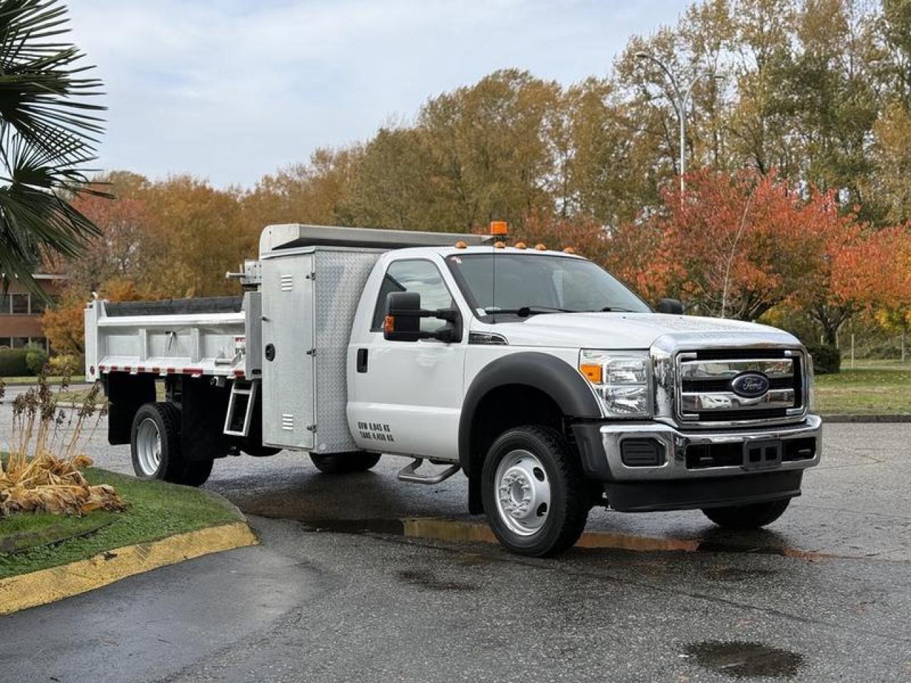 Used 2012 Ford F-550 11-Foot Dump Truck with Aluminum Cabinets & PTO for sale in Burnaby, BC