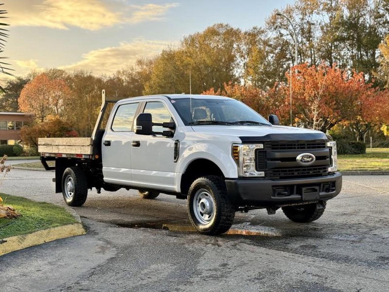 Used 2018 Ford F-350 SD 4×4 Crew Cab with 8-Foot Flat Deck for sale in Burnaby, BC