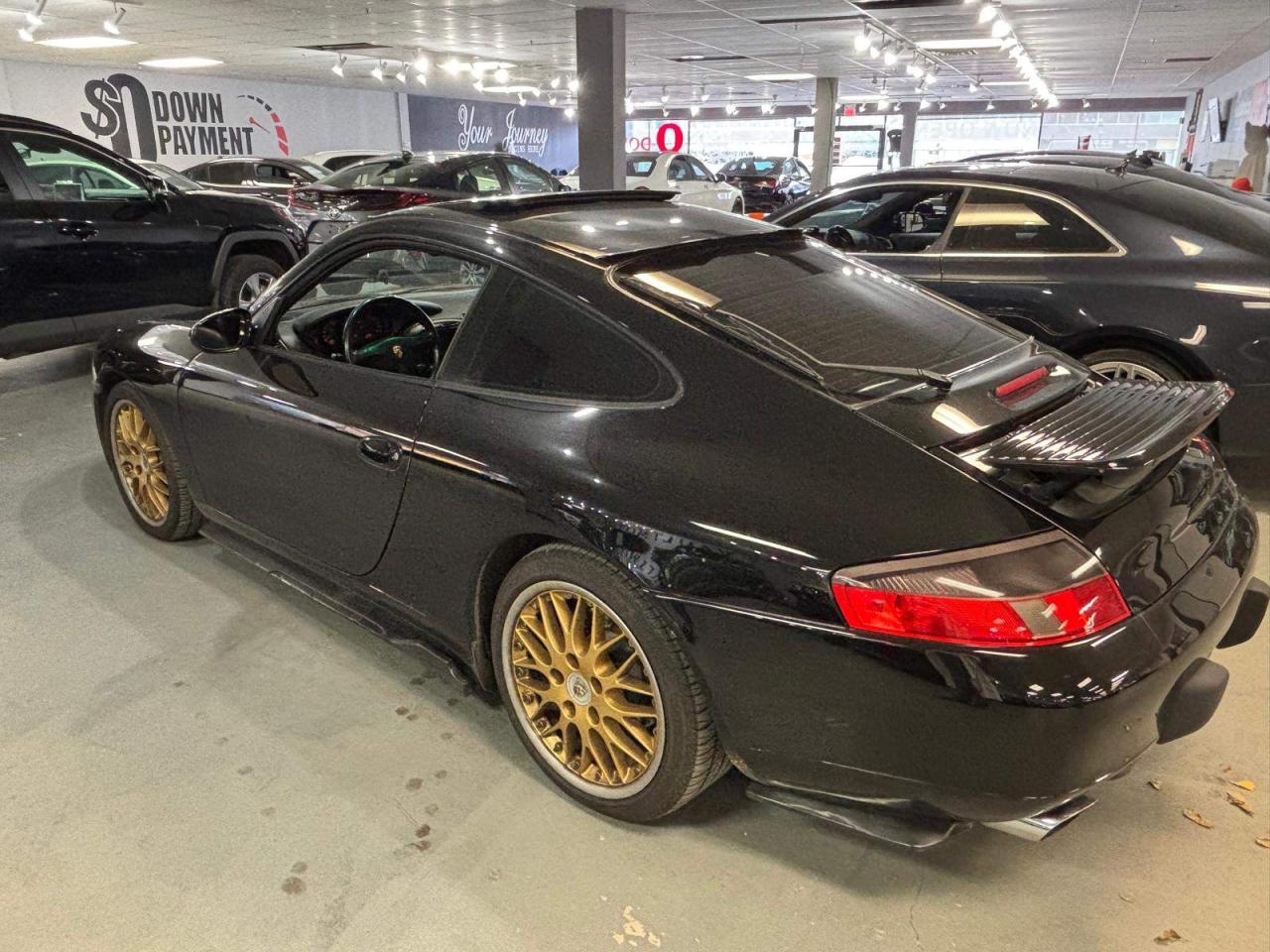 1999 Porsche 911 Carrera 2dr Carrera Cpe 6-Spd Manual Photo3