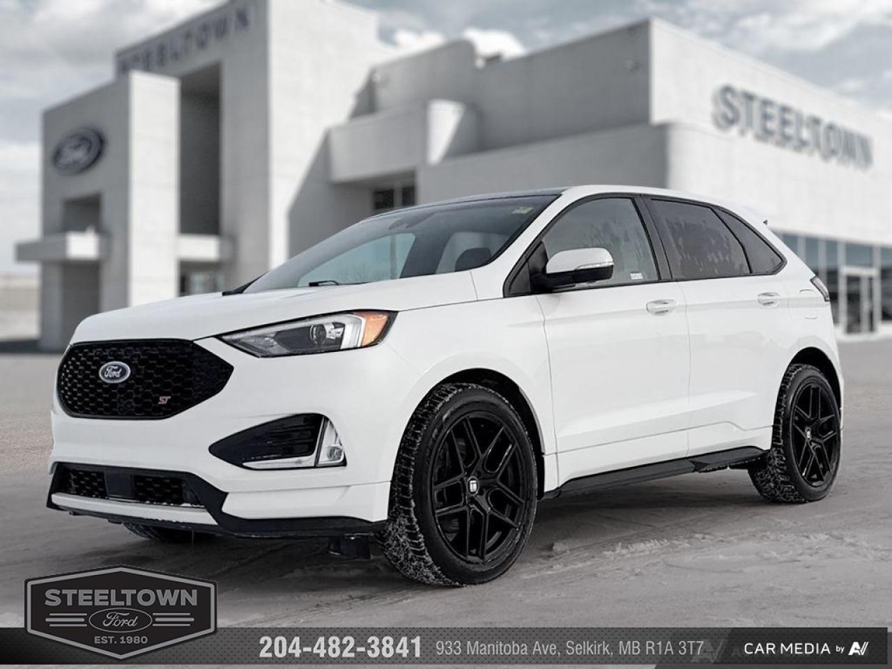 <b>Sport Suspension,  Tow Package,  Leather Seats,  Premium Audio,  Heated Seats!</b><br> <br> We value your TIME, we wont waste it or your gas is on us!   We offer extended test drives and if you cant make it out to us we will come straight to you!<br><br><br> <br>  Fuel efficient with unstoppable performance, the Ford Edge is here to get you where ever you want to go. This 2022 Ford Edge is for sale today in Selkirk. <br> <br>With meticulous attention to detail and amazing style, the Ford Edge seamlessly integrates power, performance and handling with awesome technology to help you multitask your way through the challenges that life throws your way. Made for an active lifestyle and spontaneous getaways, the Ford Edge is as rough and tumble as you are. Push the boundaries and stay connected to the road with this sweet ride!This  SUV has 67,694 kms. Its White in colour. It has an Automatic transmission and is powered by a  335HP 2.7L V6 Cylinder Engine. This unit has some remaining factory warranty for added peace of mind. <br> <br> Our Edges trim level is ST. Stepping up to this Ford Edge ST is an excellent choice as it comes fully loaded with an impressive list of aggressive features including unique aluminum wheels, exclusive exterior styling and a black front grille, a Bang & Olufsen 12 speaker premium sound system, power rear liftgate, heated leather seats with Miko suede inserts, FordPass Connect with a 4G LTE hotspot, an 12 inch touchscreen featuring SYNC 4, wireless Apple CarPlay and Android Auto, a leather wrapped steering wheel and dual zone automatic climate control. For added safety and convenience, you will also get Ford Co-Pilot360 with blind spot assist, lane keep assist, automatic emergency braking, lane departure warning, a proximity key for push button start, front fog lights, a remote engine start and a rear view camera with rear parking sensors. This vehicle has been upgraded with the following features: Sport Suspension,  Tow Package,  Leather Seats,  Premium Audio,  Heated Seats,  Power Liftgate,  Apple CarPlay. <br> To view the original window sticker for this vehicle view this <a href=http://www.windowsticker.forddirect.com/windowsticker.pdf?vin=2FMPK4AP3NBA46127 target=_blank>http://www.windowsticker.forddirect.com/windowsticker.pdf?vin=2FMPK4AP3NBA46127</a>. <br/><br> <br>To apply right now for financing use this link: <a href=http://www.steeltownford.com/?https://CreditOnline.dealertrack.ca/Web/Default.aspx?Token=bf62ebad-31a4-49e3-93be-9b163c26b54c&La target=_blank>http://www.steeltownford.com/?https://CreditOnline.dealertrack.ca/Web/Default.aspx?Token=bf62ebad-31a4-49e3-93be-9b163c26b54c&La</a><br><br> <br/><br> Buy this vehicle now for the lowest bi-weekly payment of <b>$229.49</b> with $0 down for 96 months @ 8.99% APR O.A.C. ( Plus applicable taxes -  Platinum Shield Protection & Tire Warranty included   / Total cost of borrowing $13735   ).  See dealer for details. <br> <br>Family owned and operated in Selkirk for 35 Years.  <br>Steeltown Ford is located just 20 minutes North of the Perimeter Hwy, with an onsite banking center that offers free consultations. <br>Ask about our special dealer rates available through all major banks and credit unions.<br><br><br>Steeltown Ford Protect Plus includes:<br>- Life Time Tire Warranty <br>Cars cost less in Selkirk <br><br>Dealer Permit # 1039<br><br><br> Come by and check out our fleet of 100+ used cars and trucks and 140+ new cars and trucks for sale in Selkirk.  o~o