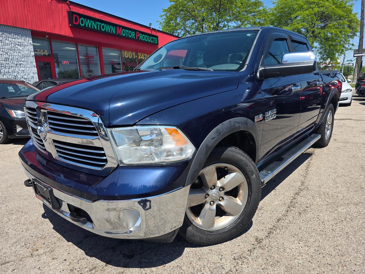 2015 RAM 1500 Big Horn 4WD Crew Cab Photo1