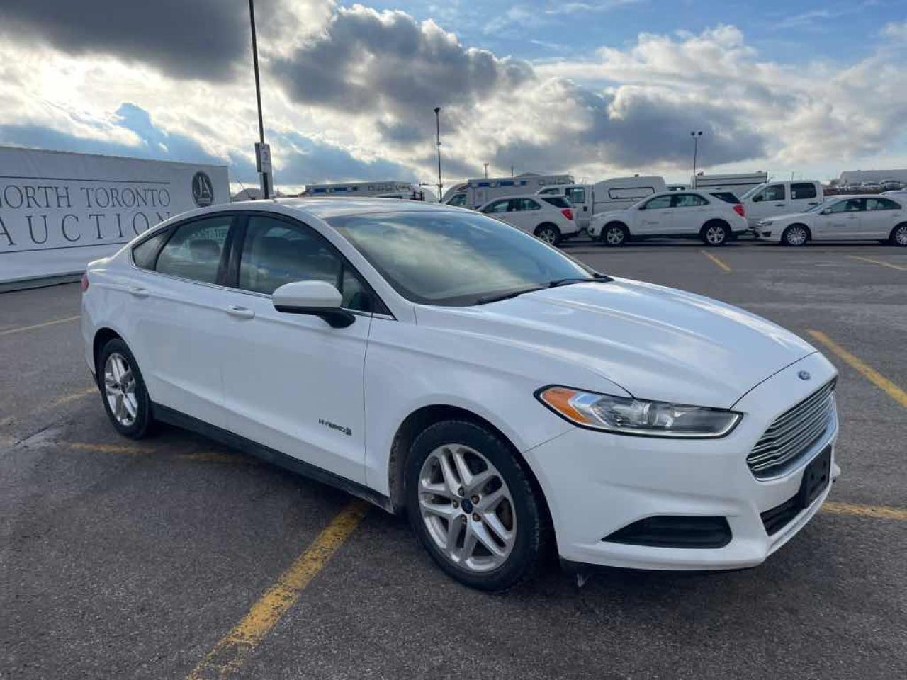 2014 Ford Fusion S Hybrid Photo2