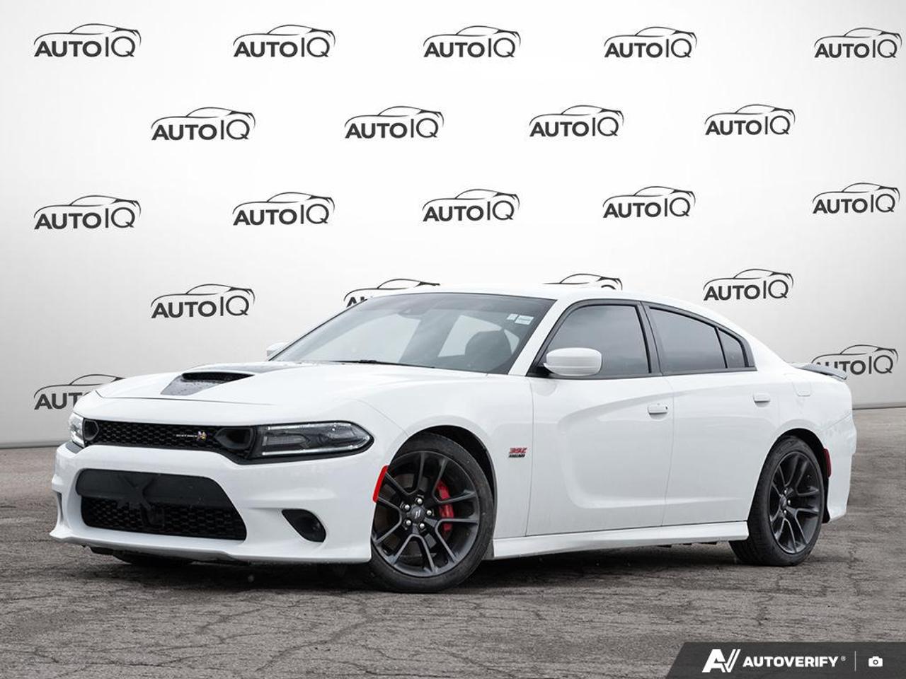 CARFAX Canada No Reported Accidents | Plus Group | Technology Group | Driver Convenience Group | Navigation & Travel Group | Red Brake Calipers<br><br>Remote Start, Black W/Black/Red Inserts Leather, 4-Wheel Disc Brakes, ABS brakes, Adaptive Cruise Control w/Stop, Advanced Brake Assist, Air Conditioning, Apple CarPlay/Android Auto, Auto-Dimming Exterior Driver Mirror, Automatic High-Beam Headlamp Control, Automatic temperature control, Bifunctional HID Projector Headlamps, Black-Edged Premium Floor Mats, Blind-Spot/Rear Cross-Path Detection, Brake Calipers - Red, Bumpers: body-colour, Driver Convenience Group, Driver/Front Passenger Lower LED Lamps, Dual front impact airbags, Exterior Mirrors w/Auto-Adjust In Reverse, Exterior Mirrors w/Courtesy Lamps, Forward Collision Warn/Active Braking, Front dual zone A/C, Front Overhead LED Lighting, Front Ventilated Seats, Fully automatic headlights, GPS Navigation, Heated door mirrors, Heated steering wheel, Integrated Centre Stack Radio, Lane Departure Warn/Lane Keep Assist, Leather/Alcantara-Faced Seats, Navigation & Travel Group, ParkView Rear Back-Up Camera, Plus Group, Power 4-Way Driver & Passenger Lumbar Adjust, Power door mirrors, Power Driver & Front Passenger Seats, Power driver seat, Power Heated Mirrors w/Blind Spot/Memory, Power steering, Power Tilt/Telescoping Steering Column, Power windows, Premium-Stitched Dash Panel, Quick Order Package 21W Scat Pack 392, Radio: Uconnect 4C Nav w/8.4 Display, Radio/Driver Seat/Mirrors w/Memory, Rear Illuminated Cup Holders, Rear Seat Armrest w/Storage Cup Holder, Rear window defroster, Remote keyless entry, Second-Row Heated Seats, SiriusXM Traffic, SiriusXM Travel Link, Steering wheel mounted audio controls, Technology Group, Telescoping steering wheel, Tilt steering wheel, Variably intermittent wipers, Wheels: 20 x 9 Low Gloss Granite Crystal.<br><br>White Knuckle Clearcoat<br>2021 Dodge Charger R/T Scat Pack<br>4D Sedan<br>SRT HEMI 6.4L V8 with Fuelsaver MDS 8-Speed Automatic<br>RWD<p></p>

<h4>PRE-OWNED PERFORMANCE VEHICLE</h4>

<p>36-point Provincial Safety Inspection<br />
172-point inspection combined mechanical, aesthetic, functional inspection including a vehicle report card<br />
Warranty: 30 Days or 1500 KMS on mechanical safety-related items and extended plans are available<br />
Complimentary CARFAX Vehicle History Report<br />
2X Provincial safety standard for tire tread depth<br />
2X Provincial safety standard for brake pad thickness<br />
Market Value Report provided<br />
Complimentary 3 months SIRIUS XM satellite radio subscription on equipped vehicles<br />
Complimentary wash and vacuum<br />
Vehicle scanned for open recall notifications from manufacturer<br />

<p>SPECIAL NOTE: This vehicle is reserved for AutoIQs retail customers only. Please, No dealer calls. Errors & omissions excepted.</p>

<p>*As-traded, specialty or high-performance vehicles are excluded from the 7-Day Money Back Guarantee Program (including, but not limited to Ford Shelby, Ford mustang GT, Ford Raptor, Chevrolet Corvette, Camaro 2SS, Camaro ZL1, V-Series Cadillac, Dodge/Jeep SRT, Hyundai N Line, all electric models)</p>
