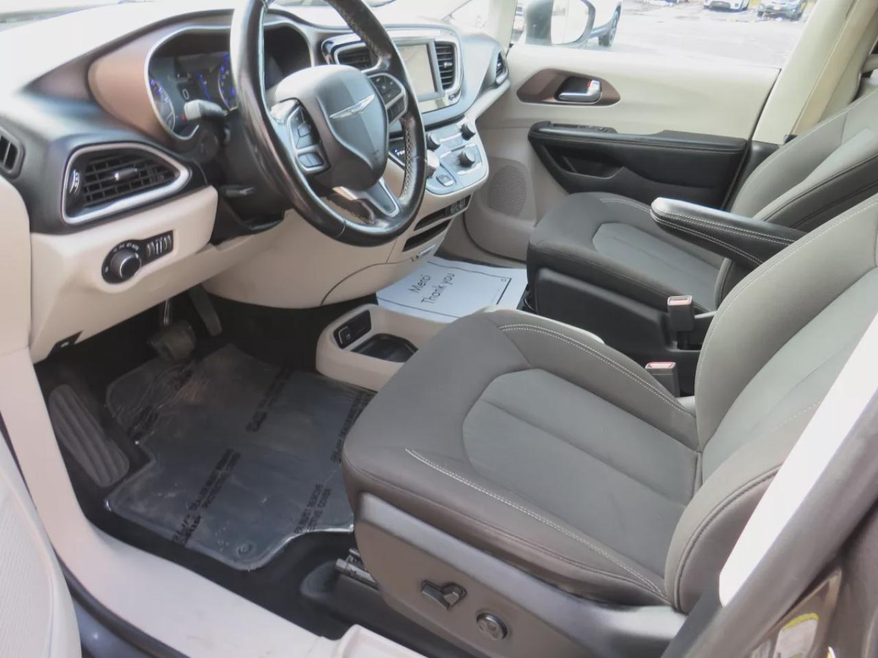 2021 Dodge Grand Caravan SXT (**CLEAN TITLE/NO ACCIDENTS!!**SAFETY/CERTIFIED!!**7 PASSENGER!!**STOW & GO SEATING**ALLOY RIMS**POWER SEATS**DIGITAL TOUCHSCREEN**HEATED SEATS/STEERING WHEEL**PUSH BUTTON START**REVERSE CAMERA**DUAL CLIMATE CONTROL**BLUETOOTH**CRUISE CONTROL**) Photo