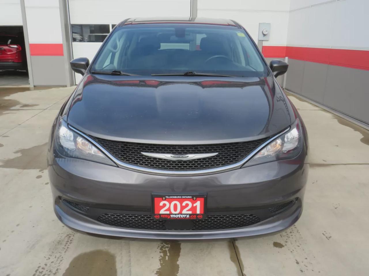 2021 Dodge Grand Caravan SXT (**CLEAN TITLE/NO ACCIDENTS!!**SAFETY/CERTIFIED!!**7 PASSENGER!!**STOW & GO SEATING**ALLOY RIMS**POWER SEATS**DIGITAL TOUCHSCREEN**HEATED SEATS/STEERING WHEEL**PUSH BUTTON START**REVERSE CAMERA**DUAL CLIMATE CONTROL**BLUETOOTH**CRUISE CONTROL**) Photo