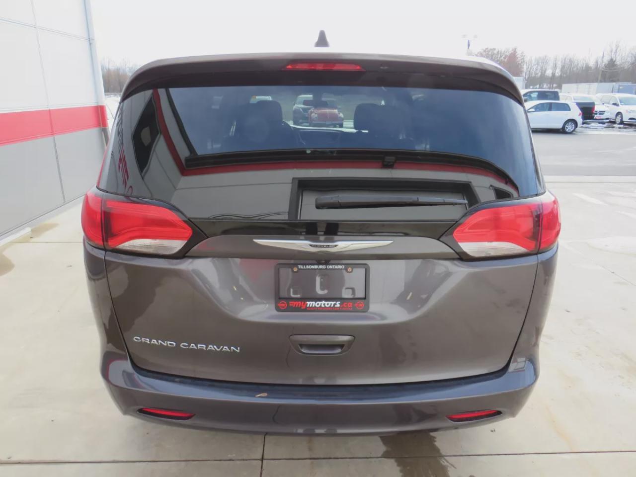 2021 Dodge Grand Caravan SXT (**CLEAN TITLE/NO ACCIDENTS!!**SAFETY/CERTIFIED!!**7 PASSENGER!!**STOW & GO SEATING**ALLOY RIMS**POWER SEATS**DIGITAL TOUCHSCREEN**HEATED SEATS/STEERING WHEEL**PUSH BUTTON START**REVERSE CAMERA**DUAL CLIMATE CONTROL**BLUETOOTH**CRUISE CONTROL**) Photo