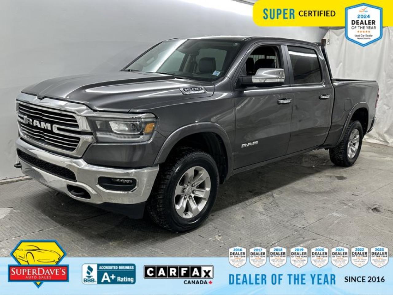 Heated Steering Wheel, TRANSMISSION: 8-SPEED AUTOMATIC  (STD), TRAILER BRAKE CONTROL, QUICK ORDER PACKAGE 27H LARAMIE  -inc: Engine: 5.7L HEMI VVT V8 w/MDS & eTorque, Transmission: 8-Speed Automatic, GVWR: 3,220 KGS (7,100 LBS)  (STD), GRANITE CRYSTAL METALLIC, Compass, CLASS IV RECEIVER HITCH, 3.21 REAR AXLE RATIO  (STD), Wireless Phone Connectivity. This Ram 1500 has a dependable Gas/Electric V-8 5.7 L/345 engine powering this Automatic transmission. 
 
 Experience a Fully-Loaded Ram 1500 Laramie 
 Vinyl Door Trim Insert, Variable Intermittent Wipers, USB Mobile Projection, Transmission w/Driver Selectable Mode, Trailer Wiring Harness, Tires: 275/65R18 BSW All Season LRR, Tire Specific Low Tire Pressure Warning, Tailgate Rear Cargo Access, Streaming Audio, Steel Spare Wheel, Solid Axle Rear Suspension w/Coil Springs, Side Impact Beams, Short And Long Arm Front Suspension w/Coil Springs, Sentry Key Immobilizer, Seats w/Leatherette Back Material, Remote Keyless Entry w/Integrated Key Transmitter, Illuminated Entry and Panic Button, Regular Box Style, Redundant Digital Speedometer, Rear Child Safety Locks, Radio w/Seek-Scan, Clock, Speed Compensated Volume Control, Aux Audio Input Jack, Steering Wheel Controls, Voice Activation, Radio Data System and External Memory Control. 


THE SUPER DAVES ADVANTAGE
 
BUY REMOTE - No need to visit the dealership. Through email, text, or a phone call, you can complete the purchase of your next vehicle all without leaving your house!
 
DELIVERED TO YOUR DOOR - Your new car, delivered straight to your door! When buying your car with Super Daves, well arrange a fast and secure delivery. Just pick a time that works for you and well bring you your new wheels!
 
PEACE OF MIND WARRANTY - Every vehicle we sell comes backed with a warranty so you can drive with confidence.
 
EXTENDED COVERAGE - Get added protection on your new car and drive confidently with our selection of competitively priced extended warranties.
 
WE ACCEPT TRADES - We&rsquo;ll accept your trade for top dollar! We&rsquo;ll assess your trade in with a few quick questions and offer a guaranteed value for your ride. We&rsquo;ll even come pick up your trade when we deliver your new car.
 
SUPER CERTIFIED INSPECTION - Every vehicle undergoes an extensive 120 point inspection, that ensure you get a safe, high quality used vehicle every time.
 
FREE CARFAX VEHICLE HISTORY REPORT - If youre buying used, its important to know your cars history. Thats why we provide a free vehicle history report that lists any accidents, prior defects, and other important information that may be useful to you in your decision.
 
METICULOUSLY DETAILED &ndash; Buying used doesn&rsquo;t mean buying grubby. We want your car to shine and sparkle when it arrives to you. Our professional team of detailers will have your new-to-you ride looking new car fresh.
 
(Please note that we make all attempt to verify equipment, trim levels, options, accessories, kilometers and price listed in our ads however we make no guarantees regarding the accuracy of these ads online. Features are populated by VIN decoder from manufacturers original specifications. Some equipment such as wheels and wheels sizes, along with other equipment or features may have changed or may not be present. We do not guarantee a vehicle manual, manuals can be typically found online in the rare event the vehicle does not have one. Please verify all listed information with our dealership in person before purchase. The sale price does not include any ongoing subscription based services such as Satellite Radio. Any software or hardware updates needed to run any of these systems would also be the responsibility of the client. All listed payments are OAC which means On Approved Credit and are estimated without taxes and fees as these may vary from deal to deal, taxes and fees are extra. As these payments are based off our lenders best offering they may be subject to change without notice. Please ensure this vehicle is ready to be viewed at the dealership by making an appointment with our sales staff. We cannot guarantee this vehicle will be on premises and ready for viewing unless and appointment has been made.)