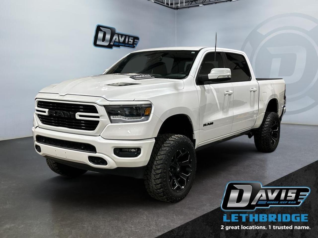 <b>5.7L Hemi - Lifted - A/T Wheel Pkg - Heated Seats & Steering Wheel - Remote Start - Power Side Steps <br /> <br /></b><br /> Make light work of tough jobs with exceptional towing, torque and payload capability. This 2020 Ram 1500 is for sale today in Lethbridge. <br /> <br />The Ram 1500 delivers power and performance everywhere you need it, with a tech-forward cabin that is all about comfort and convenience. Loaded with best-in-class features, it's easy to see why the Ram 1500 is so popular. With the most towing and hauling capability in a Ram 1500, as well as improved efficiency and exceptional capability, this truck has the grit to take on any task. This Crew Cab 4X4 pickup has 153,180 km. Stock number 40769 is nice in colour. It has an Automatic transmission and is powered by a 395HP 5.7L 8 Cylinder Engine. <br /> <br /> Our 1500's trim level is Sport. This Ram 1500 Sport comes very well equipped with performance styling, unique aluminum wheels, a heated leather steering wheel, heated front seats, Uconnect 4 with a larger touchscreen, Apple CarPlay, Android Auto, wireless streaming audio, USB input jacks, and a useful rear view camera. This sleek pickup truck also comes with body-colored bumpers with rear step, a power rear window and power heated side mirrors, proximity keyless entry, cruise control, LED Lights, an HD suspension, towing equipment, a Parkview rear camera, front fog lights and so much more. This vehicle has been upgraded with the following features: Heated Seats, Remote Start, Heated Steering Wheel, Apple CarPlay, Android Auto, Aluminum Wheels, Proximity Key.<br /> <br />To apply right now for financing use this link: <a href=https://www.bridgecitychrysler.com/pre-approval/ target=_blank rel=nofollow noopener noreferrer>https://www.bridgecitychrysler.com/pre-approval/</a><br /><br /> <br /><br />Locally Owned & Trusted for Over 35 Years  Bridge City Chrysler in Lethbridge, AB <br /><br /> At Bridge City Chrysler, weve proudly served the Lethbridge community for more than 35 years, offering an unparalleled car buying experience. Dont just take our word for itour Google reviews speak volumes about our commitment to exceptional service. <br /><br /> Delivery & At-Home Test Drives: Convenient options to suit your lifestyle. <br /><br /> Flexible Financing for Everyone: Get the vehicle you need with financing solutions tailored to your situation. <br /><br /> Full Mechanical Inspections & Professional Cleaning: Every vehicle is thoroughly inspected and cleaned before it hits our lot.<br /><br /> We take all makes and models on trade and offer competitive pricing with inventory that changes daily. Whether you're shopping for a Chrysler, Dodge, Jeep, RAM, or FIAT, our AMVIC Licensed dealership makes it easy to browse, buy, and drive away.<br /><br /> Located in Lethbridge, AB, we proudly serve customers in Fort Macleod, Taber, Claresholm, and Coaldale. Shop online or visit us today to experience the best in sales, service, and selection. Standard bank rates apply; taxes are additional.<br /><br /> Vehicle pricing offer shown expires 2026-01-31. <br /> Come by and check out our fleet of 80+ used cars and trucks and 130+ new cars and trucks for sale in Lethbridge. o~o