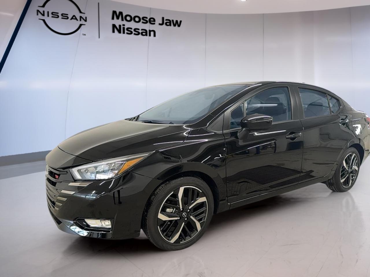 Experience the perfect blend of style, technology and efficiency with the brand new 2025 Nissan Versa SR, now available at Moose Jaw Nissan. This sedan stands out with its bold black exterior and refined brown interior, offering a modern look both inside and out. Enjoy smooth driving thanks to the Xtronic Continuously Variable Transmission and responsive front-wheel drive. Powered by a reliable 1.6L DOHC 16-valve 4-cylinder engine, the Versa SR is designed for Canadian roads and daily commutes.

FEATURES OF THE Versa SR  
»» Sporty exterior accents and unique SR badging  
»» 17-inch alloy wheels for enhanced road presence  
»» LED headlights and signature daytime running lights  
»» Rear spoiler for a dynamic, athletic profile  

ADVANCED SAFETY FEATURES  
»» Intelligent emergency braking with pedestrian detection  
»» Rear automatic braking for added peace of mind  
»» Lane departure warning for safer highway driving  
»» Blind spot warning system for improved visibility  

PERFORMANCE AND EFFICIENCY  
»» 1.6L DOHC 16-valve 4-cylinder engine  
»» Xtronic Continuously Variable Transmission for fuel efficiency  
»» Front-wheel drive offering confident handling  
»» Impressive fuel economy for daily commutes  

COMFORT AND CONVENIENCE  
»» Automatic climate control for year-round comfort  
»» Heated front seats for cold Canadian mornings  
»» Remote keyless entry for easy access  
»» 60/40 split folding rear seats for flexibility  

TECHNOLOGY AND CONNECTIVITY  
»» 8-inch touchscreen display with intuitive controls  
»» Apple CarPlay and Android Auto integration  
»» Bluetooth hands-free phone system  
»» USB ports for device charging and connectivity  

CARGO SPACE  
»» Generous trunk capacity for luggage or groceries  
»» Fold-down rear seats for extended cargo room  
»» Wide trunk opening for easy loading  
»» Hidden storage compartments for valuables  

WHAT OTHER OWNERS LIKE  
»» User-friendly infotainment system and connectivity options  
»» Comfortable ride quality for city and highway  
»» Excellent fuel efficiency and low running costs  
»» Advanced safety features for added confidence  

This 2025 Nissan Versa SRs VIN is: 3N1CN8FV2SL873113.