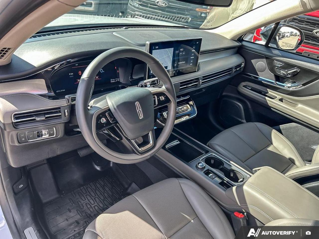 2025 Lincoln Corsair Grand Touring ALL-WTHR FLR LNRS W/MATS | PHEV A/T | FINESTRA ALUMINUM APPLUQUE | JET APPEAR PKG | 2.5L I-4 HYBRID ENG | CV | PREM LTHR-TRMD /TRUFFLE | EQUIP GRP 300A Photo