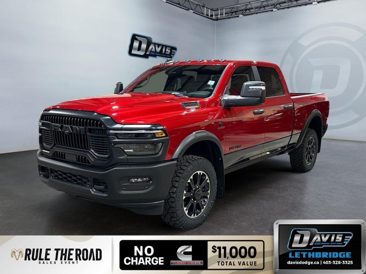 <p>Meet the <strong>2026 Ram 2500 Rebel 4x4 Crew Cab 6'4" Box</strong>, a new truck that promises uncompromising performance and rugged styling. This powerhouse comes in a striking red color and features a 4×4 drivetrain, delivering optimal handling on any terrain.</p><p><strong>Exterior Features:</strong></p><ul><li>Molten Red Pearl with Lower Two-Tone Paint</li><li>Alloy Wheels</li><li>Heavy-Duty Engine Cooling</li><li>Capless Fuel-Filler</li></ul><p><strong>Interior Features:</strong></p><ul><li>Black Interior with Heated Leather Steering Wheel</li><li>Heated Front Seats</li><li>Power Seats & Windows</li><li>Keyless Entry</li></ul><p><strong>Technology & Safety Features:</strong></p><ul><li>Adaptive Cruise Control</li><li>Backup Camera</li><li>Lane Assist & Parking Sensors</li><li>Navigation System with Wi-Fi Hotspot</li><li>Bluetooth Connection & Smart Device Integration</li></ul><p>Perfect for those who crave adventure and performance, this Ram 2500 Rebel is built for any task. Embrace the road ahead with the confidence of cutting-edge technology and safety features. Ready to experience this remarkable truck? Contact <strong>Davis Dodge Lethbridge</strong> today for more information.</p>
