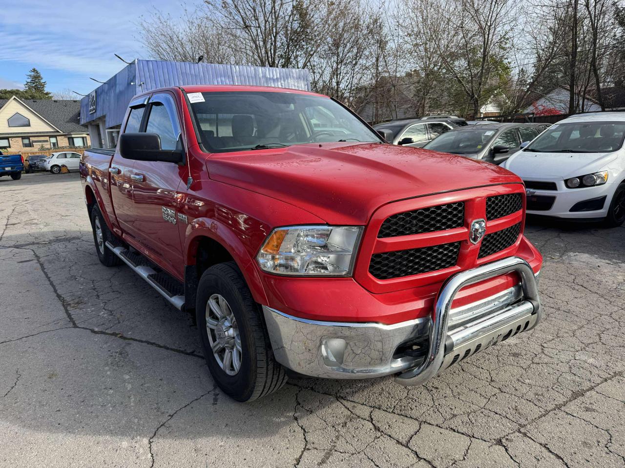2013 RAM 1500 4WD Quad Cab 140.5" Outdoorsman - Photo #1