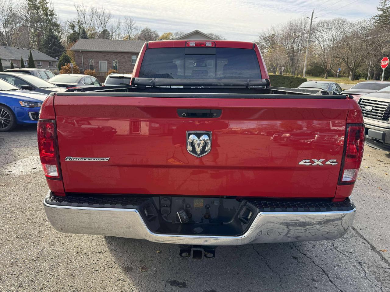 2013 RAM 1500 4WD Quad Cab 140.5" Outdoorsman - Photo #7