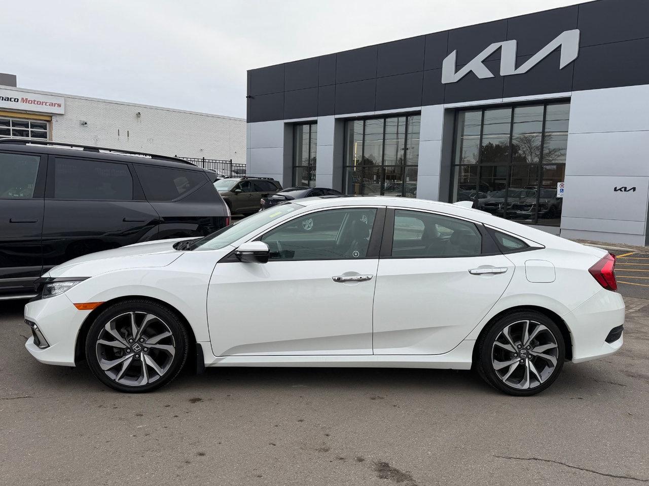 2019 Honda Civic Sedan Touring Pkg.   Remote Engine Starter, Heated Seats Photo