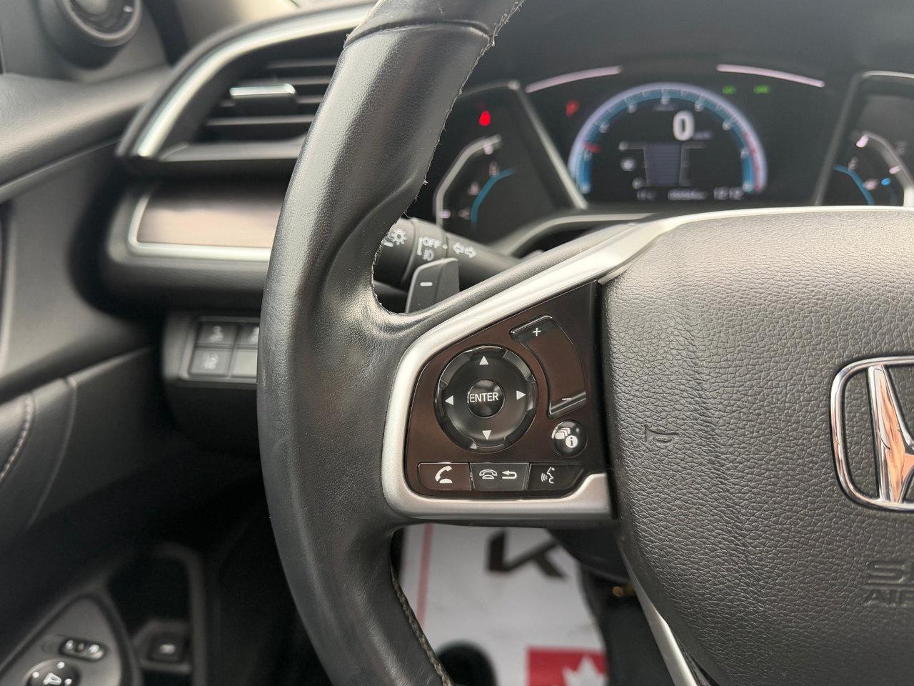 2019 Honda Civic Sedan Touring Pkg.   Remote Engine Starter, Heated Seats Photo