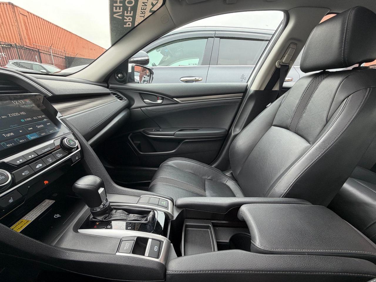 2019 Honda Civic Sedan Touring Pkg.   Remote Engine Starter, Heated Seats Photo