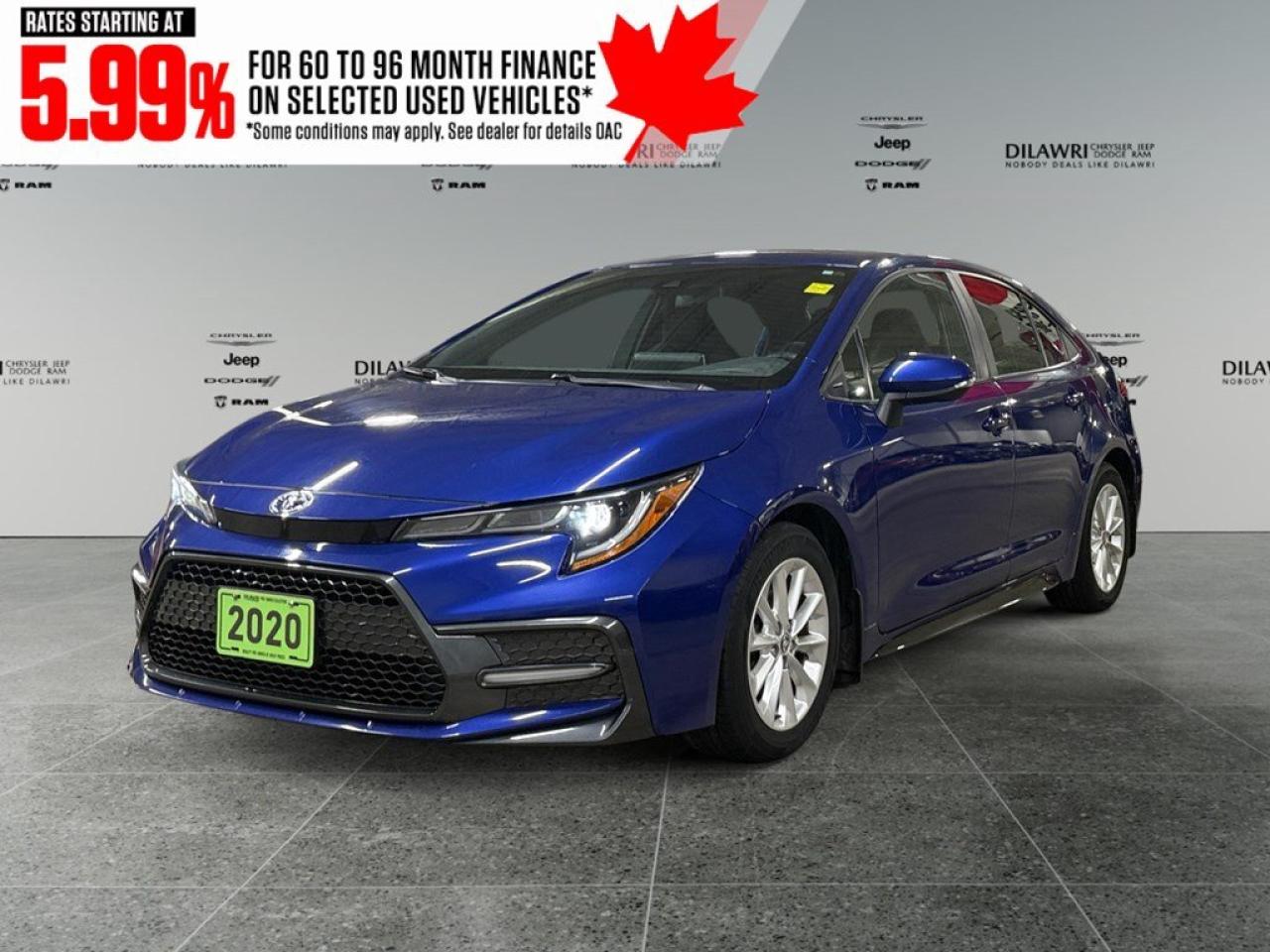 The 2020 Toyota Corolla SE CVT in a striking blue hue is a front-wheel-drive sedan that promises a balanced and responsive drive, perfect for urban and highway settings. This sleek sedan not only catches the eye with its stylish alloy wheels but also boasts a streamlined body designed for aerodynamics and visual appeal. Inside, you are greeted with a modern and comfortable environment complete with heated seats ensuring a cozy drive, no matter the season. The smart device integration and Bluetooth connection keep you connected while the spacious cabin delivers comfort and practicality. Technologically advanced, this Corolla comes with a backup camera and keyless entry for added convenience, making every journey as smooth as possible. Safety features such as lane assist and brake assist provide peace of mind on every drive. The inclusion of power windows and cruise control adds to the vehicles user-friendly nature, enhancing your driving experiences. The 2020 Toyota Corolla SE CVT is an ideal choice for professionals, small families, or anyone seeking a reliable and efficient drive with a hint of style. Contact us today to schedule a test drive or for more information on why this sedan might be the perfect fit for you.