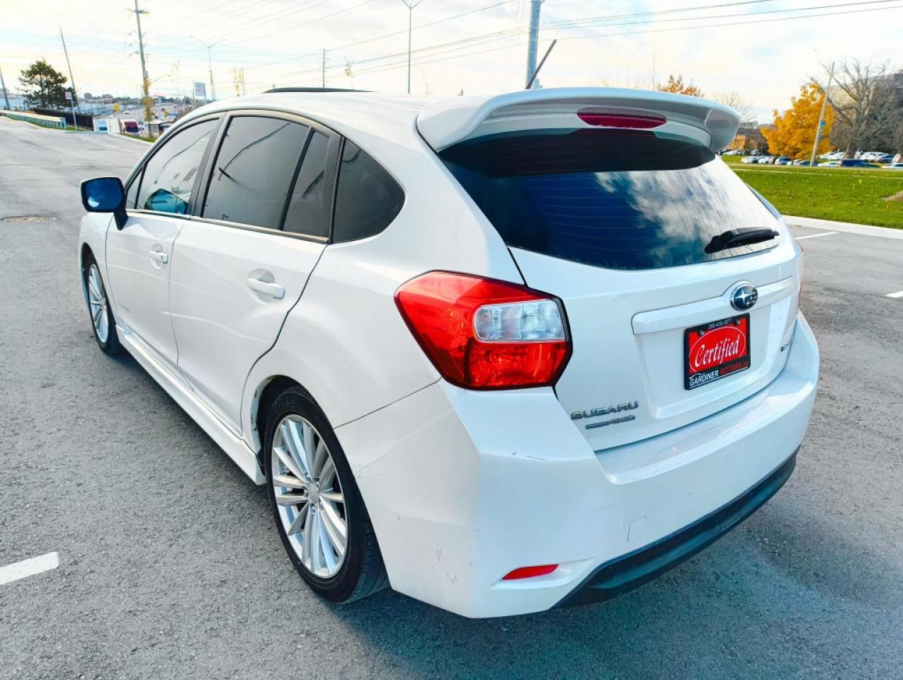 2012 Subaru Impreza 2.0i Premium PZEV 4dr Hatchback AWD (2.0L 4cyl CVT) Photo4