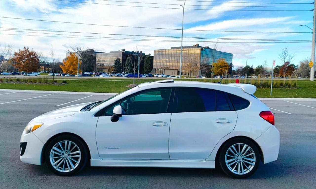 2012 Subaru Impreza 2.0i Premium PZEV 4dr Hatchback AWD (2.0L 4cyl CVT) Photo