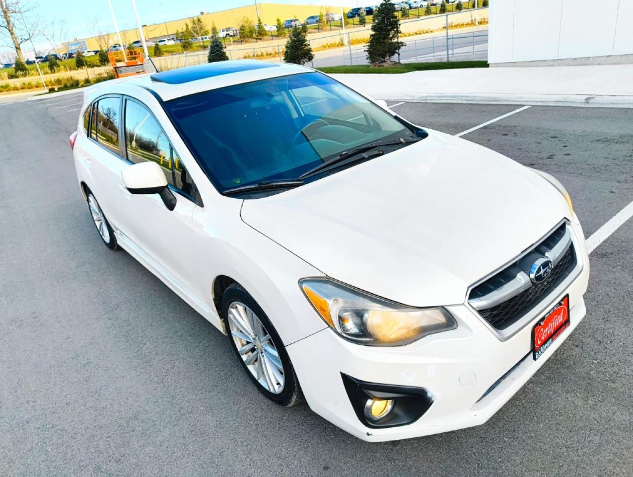 2012 Subaru Impreza 2.0i Premium PZEV 4dr Hatchback AWD (2.0L 4cyl CVT) Photo