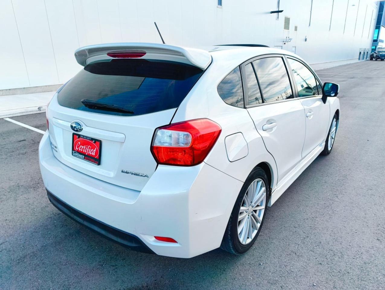 2012 Subaru Impreza 2.0i Premium PZEV 4dr Hatchback AWD (2.0L 4cyl CVT) Photo