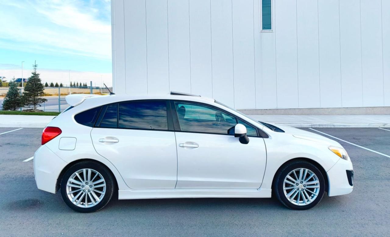2012 Subaru Impreza 2.0i Premium PZEV 4dr Hatchback AWD (2.0L 4cyl CVT) Photo