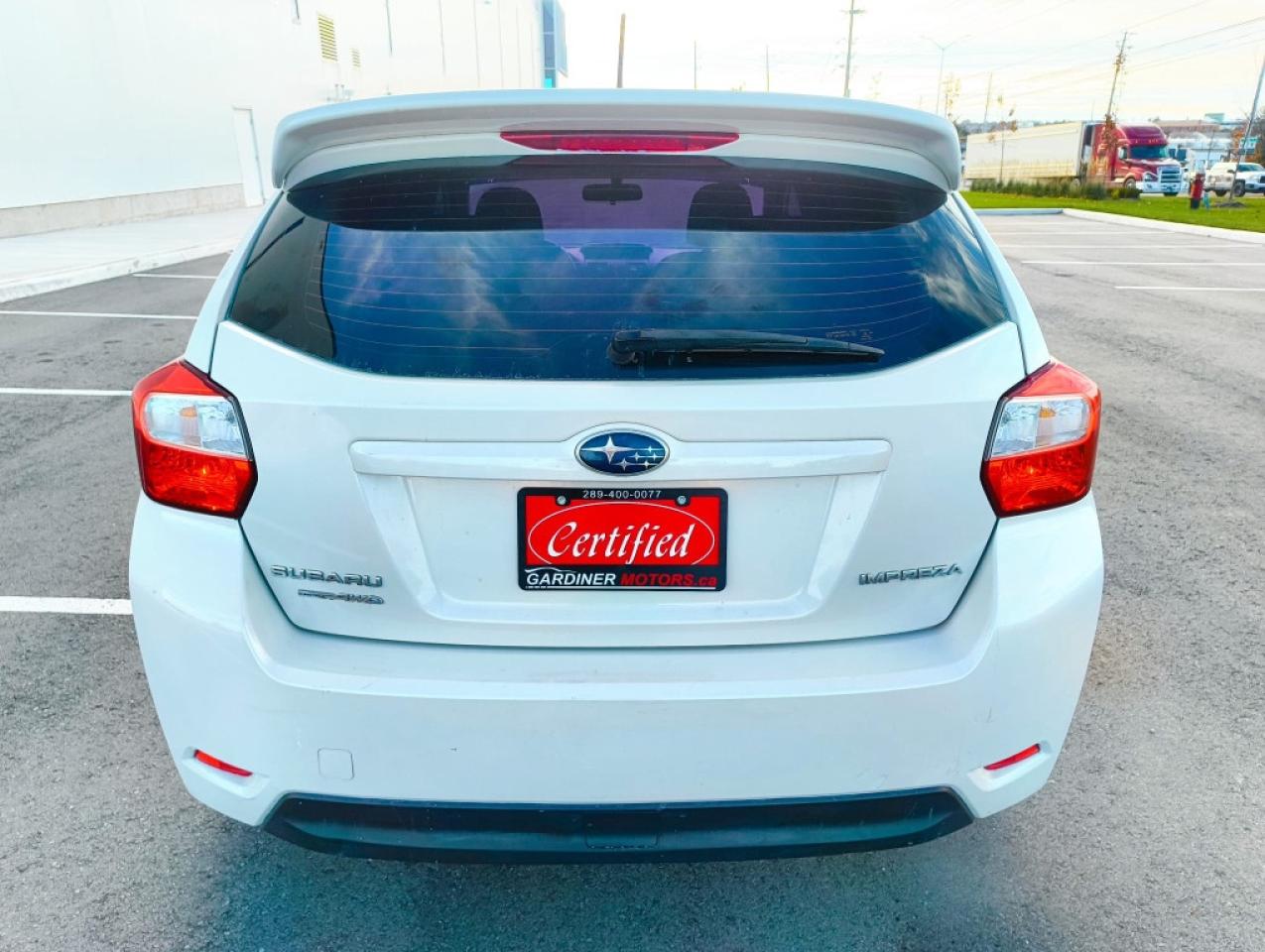 2012 Subaru Impreza 2.0i Premium PZEV 4dr Hatchback AWD (2.0L 4cyl CVT) Photo