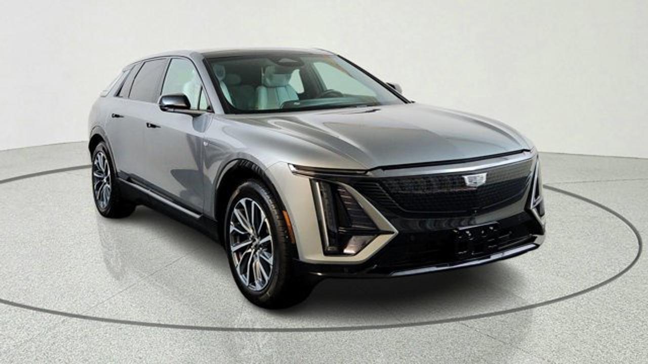 The 2024 Cadillac LYRIQ Sport is a striking all-electric SUV built on GMs Ultium platform with a 102 kWh battery, offering up to around 524 km of range. It combines powerful electric performance with bold sporty styling, including Obsidian chrome trim, dark-accent finishes, and unique 20-inch wheels. Inside, it features a luxuriously modern cabin with a 33-inch advanced LED display, Google-built infotainment, optional Nappa leather seating, and a panoramic fixed-glass roof with a power shade.