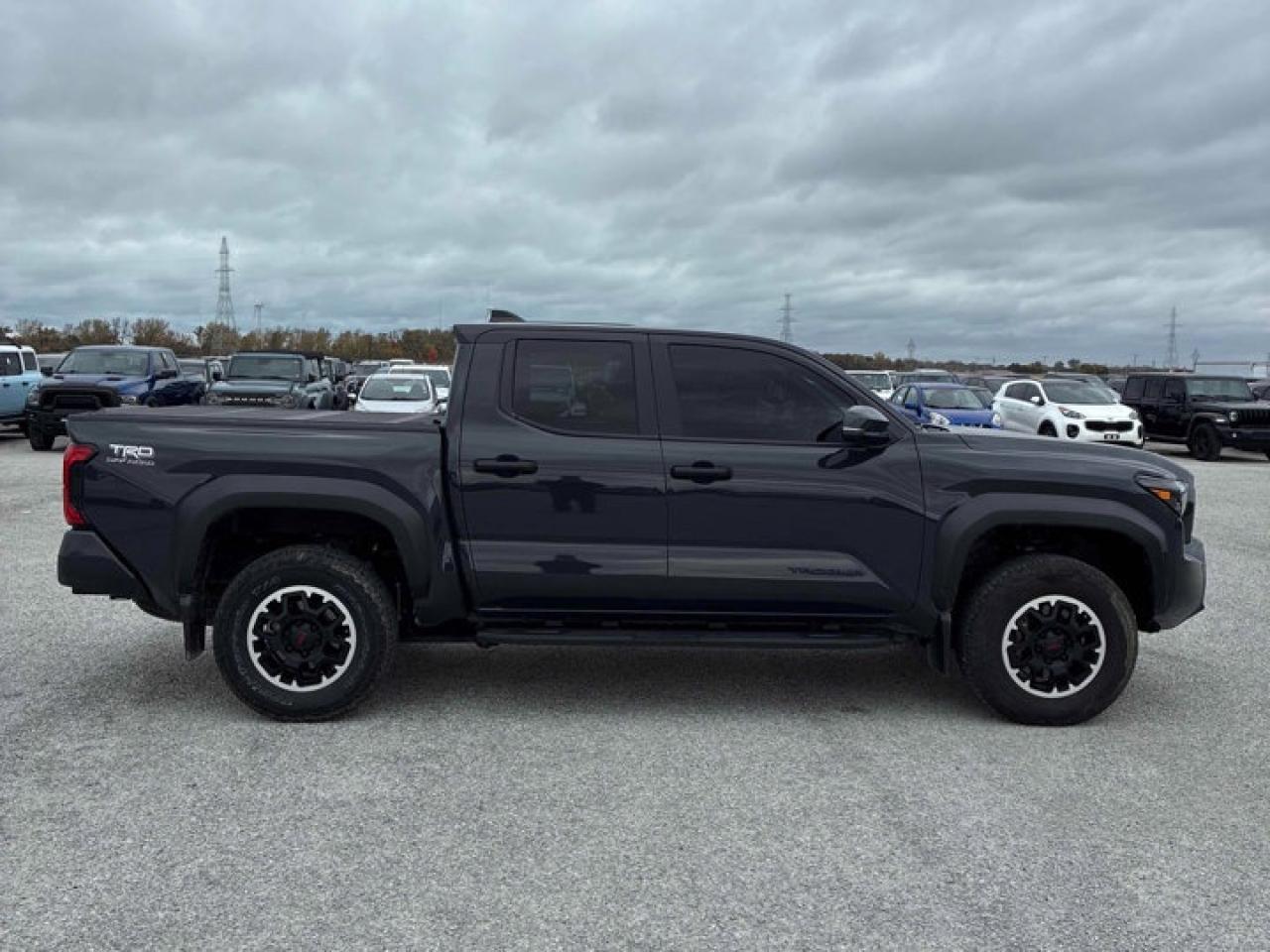2024 Toyota Tacoma TRD Off-Road Premium | Leather | Sunroof | JBL | Heated Wheel | Cooled + Heated Seats | and More ! Photo