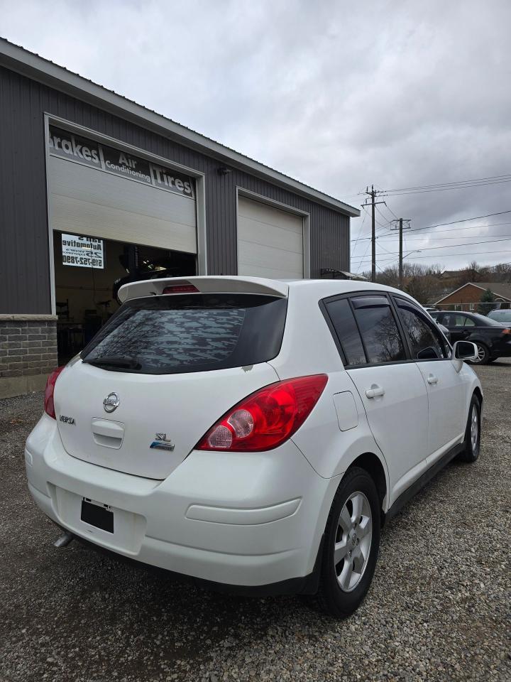 2010 Nissan Versa 5dr HB I4 CVT 1.8 SL - Photo #7
