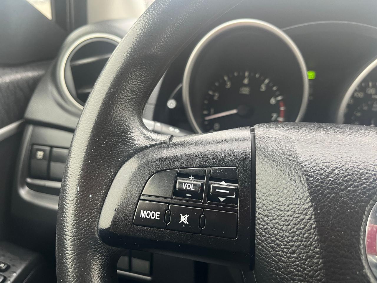 2012 Mazda MAZDA5 4dr Wgn Auto GS Photo