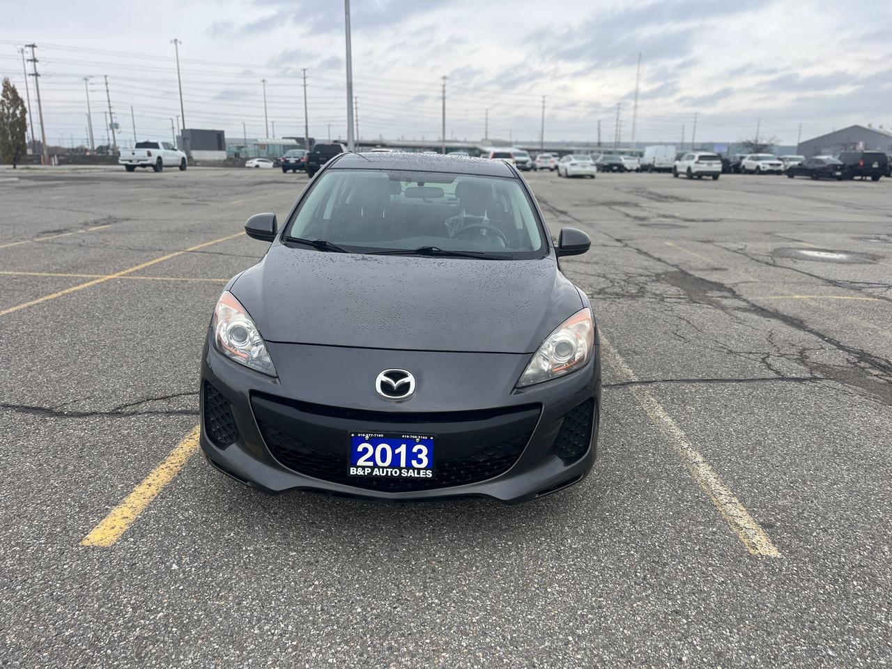 2013 Mazda MAZDA3 4dr Sdn Auto GX Photo1