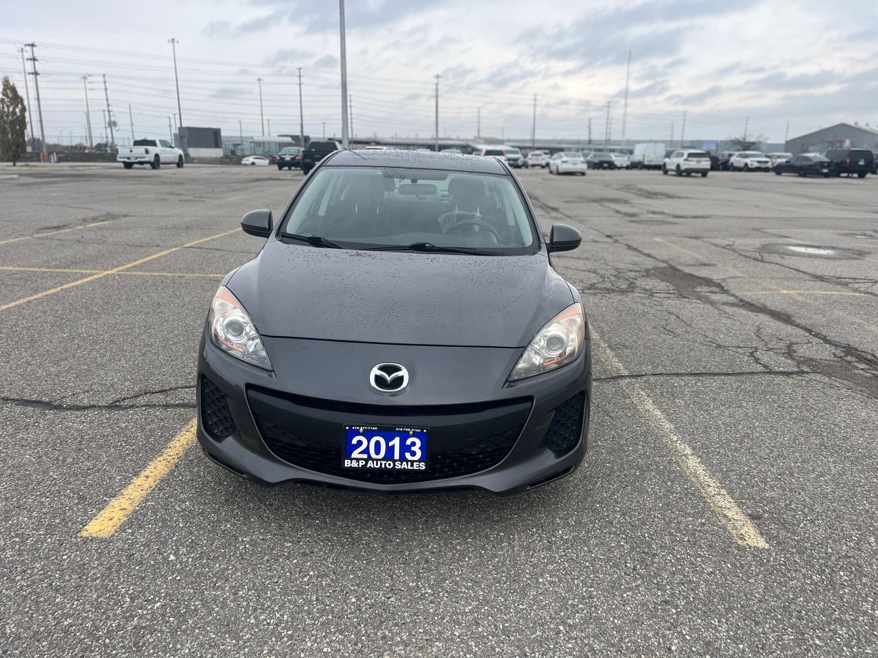 2013 Mazda MAZDA3 4dr Sdn Auto GX Photo