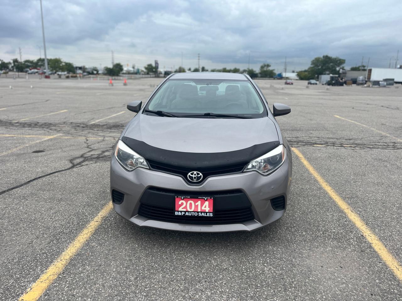 2014 Toyota Corolla 4dr Sdn CVT LE ECO Photo