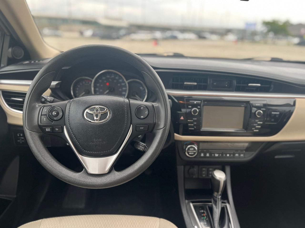 2014 Toyota Corolla 4dr Sdn CVT LE ECO Photo