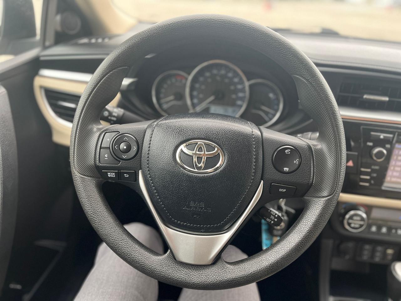 2014 Toyota Corolla 4dr Sdn CVT LE ECO Photo