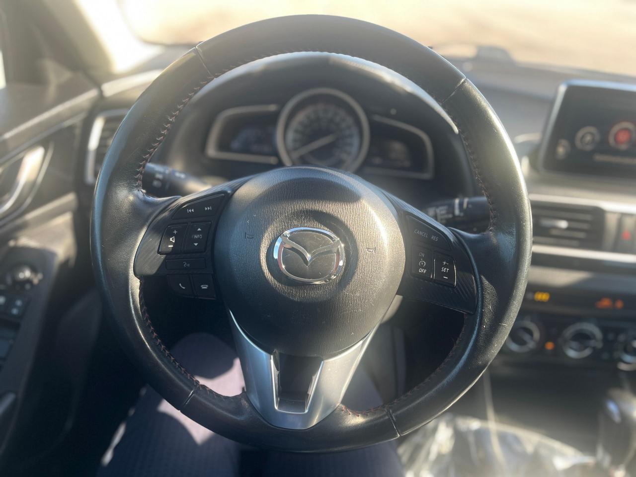 2015 Mazda MAZDA3 4dr Sdn Auto GS Photo