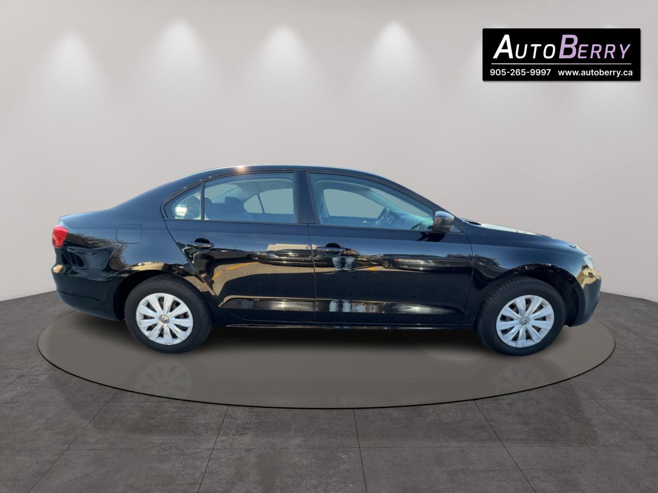 2013 Volkswagen Jetta 4dr 2.0L Man Trendline Photo