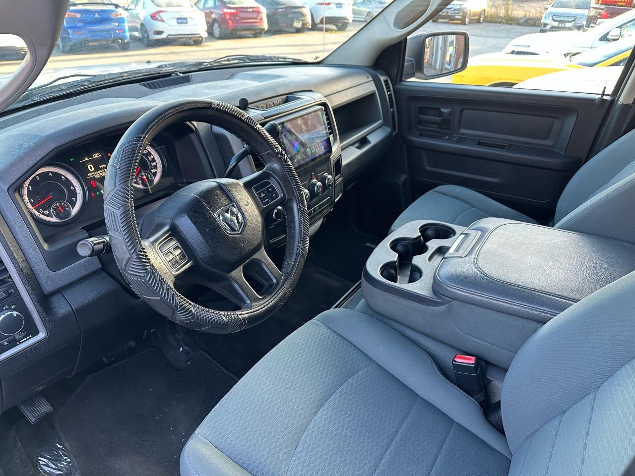 2015 RAM 1500 4WD Crew Cab 140.5" ST Photo