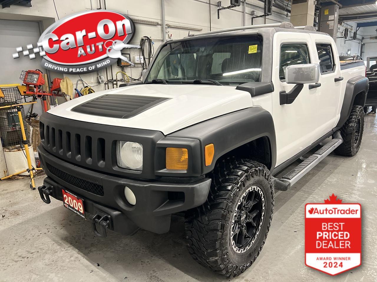 CERTIFIED!! SUPER RARE H3T ALPHA 4X4 CREW CAB PICKUP TRUCK W/ PREMIUM 5.3L V8! Heated leather seats, sunroof, tonneau cover, running boards, power seats, 5-foot box w/ spray-in bedliner, roof rack, air conditioning, automatic headlights, auto-dimming rearview mirror, garage door opener, tow package, leather-wrapped steering wheel, power windows, power locks, power mirrors and fog lights!*This car was used as a previous daily rental*