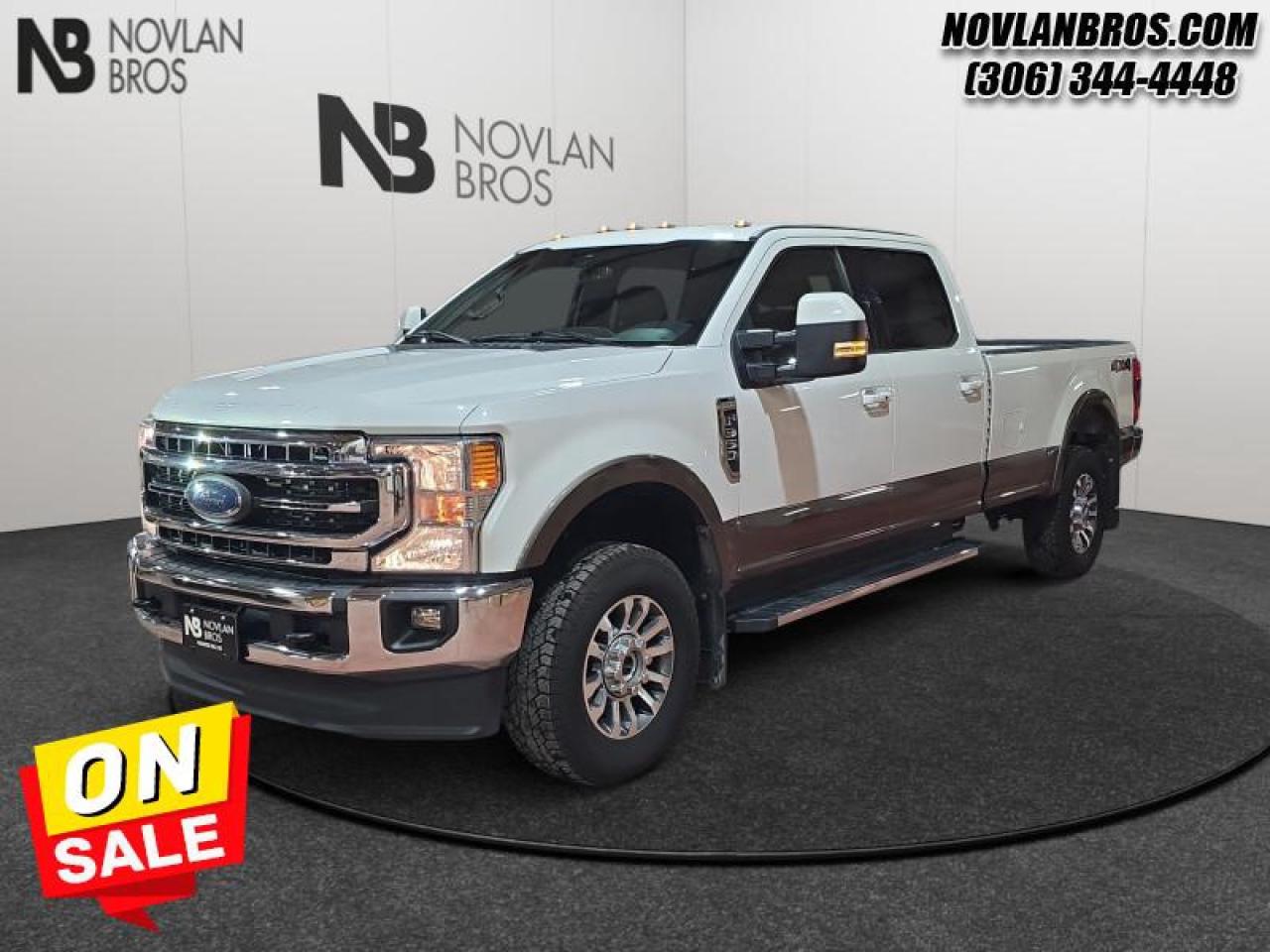 <b>Navigation, Heated Seats, Alloy Wheels, Leather Interior, Remote Engine Start!</b><br> <br> Check out our great inventory of pre-owned vehicles at Novlan Brothers!<br> <br> Hurry on this one! Marked down from $72800 - you save $3000.If you have the need to haul or tow heavy loads, this Ford F-350 should be at the top of your consideration list. This 2022 Ford F-350 Super Duty is for sale today in Paradise Hill. <br> <br>The most capable truck for work or play, this heavy-duty Ford F-350 never stops moving forward and gives you the power you need, the features you want, and the style you crave! With high-strength, military-grade aluminum construction, this F-350 Super Duty cuts the weight without sacrificing toughness. The interior design is first class, with simple to read text, easy to push buttons and plenty of outward visibility. This truck is strong, extremely comfortable and ready for anything. This Crew Cab 4X4 pickup has 72,653 km. Its White in colour. It has a 10 Speed Automatic transmission and is powered by a 430HP 7.3L 8 Cylinder Engine. It may have some remaining factory warranty, please check with dealer for details. <br> <br> Our F-350 Super Dutys trim level is Lariat. Stepping up to this premium Ford F-350 Lariat is an excellent decision as it comes loaded with unique aluminum wheels, heated and cooled leather seats, a premium Bang & Olufsen audio system with SiriusXM radio, chrome exterior accents with a built-in rear bumper step, a Class V trailer hitch and power extendable trailer style mirrors. It also includes a colour touchscreen with SYNC 4, Apple CarPlay and Android Auto, side running boards, power front seats, a digital dash, FordPass Connect 4G LTE with a smart device remote start, a power locking tailgate, Ford Co-Pilot360 with rear parking sensors, blind spot detection, a leather steering wheel, lane departure warning, automatic emergency braking, dual zone climate control, power adjustable pedals and so much more. This vehicle has been upgraded with the following features: Navigation, Heated Seats, Alloy Wheels, Leather Interior, Remote Engine Start, Rear View Camera, Reverse Sense System.<br> To view the original window sticker for this vehicle view this <a href=http://www.windowsticker.forddirect.com/windowsticker.pdf?vin=1FT8W3BN6NEC52308 target=_blank>http://www.windowsticker.forddirect.com/windowsticker.pdf?vin=1FT8W3BN6NEC52308</a>. <br/><br> <br>To apply right now for financing use this link: <a href=http://novlanbros.com/credit/ target=_blank>http://novlanbros.com/credit/</a><br><br> <br/><br>The Novlan family is owned and operated by a third generation and committed to the values inherent from our humble beginnings.<br> Come by and check out our fleet of 20+ used cars and trucks and 50+ new cars and trucks for sale in Paradise Hill.  o~o