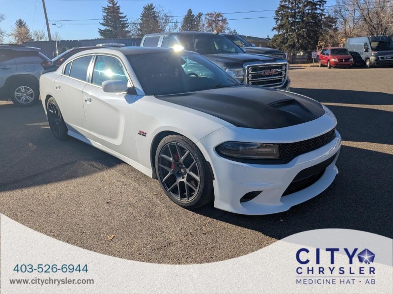 The 2017 Dodge Charger R/T 392 is a performance-oriented sedan that combines classic muscle car heritage with modern engineering. Powered by a 6.4L V8 HEMI engine pushing out 485 horsepower and paired with a rear-wheel-drive layout it delivers exhilarating acceleration and road presence. With its aggressive styling and sport-tuned suspension this Charger is built for enthusiasts who demand both power and practicality.**Specifications:****Make:** Dodge**Model Year:** 2017**Model:** Charger**Trim:** R/T 392**Body Class:** Sedan/Saloon**Vehicle Type:** Passenger Car**Drive Type:** RWD/Rear-Wheel Drive**Engine Configuration:** V-Shaped**Engine Number of Cylinders:** 8**Engine Displacement:** 6.4L**Fuel Type - Primary:** Gasoline**Engine Brake Horsepower:** 485 hp**Engine Manufacturer:** FCA**Doors:** 4**Steering Location:** Left-Hand Drive (LHD)**GVWR:** Class 1: 6000 lb or less**Seat Belt Type:** Manual**Restraint System:** Active Belts (All Seating Positions)**Front Air Bag Locations:** 1st Row (Driver and Passenger)**Side Air Bag Locations:** All Rows**Tire Pressure Monitoring System (TPMS):** Direct**Note:** Optional features such as adaptive cruise collision warning blind spot monitoring and advanced infotainment may be present but are not specified in the VIN record. Refer to the original window sticker or build sheet for detailed equipment information.City Chrysler holds a high standard of service &amp excellence for our customers. We are located on the northside of highway 3 of Medicine Hat. Servicing areas from Swift Current to Lethbridge Brooks &amp Taber. Our legacy is to make sure our customers feel right at home as well as taken care of in the highest priority. We are known for being down to earth super friendly and very knowledgeable. We provide excellent customer service and if you are tired of high-pressure sales then City Chrysler is for you. Check out our Google reviews because they tell our story. Then give us a call send us an email or stop by and let us get to work for you! Bankruptcies No credit Bad credit Slow credit Dont sweat it! Get preapproved today