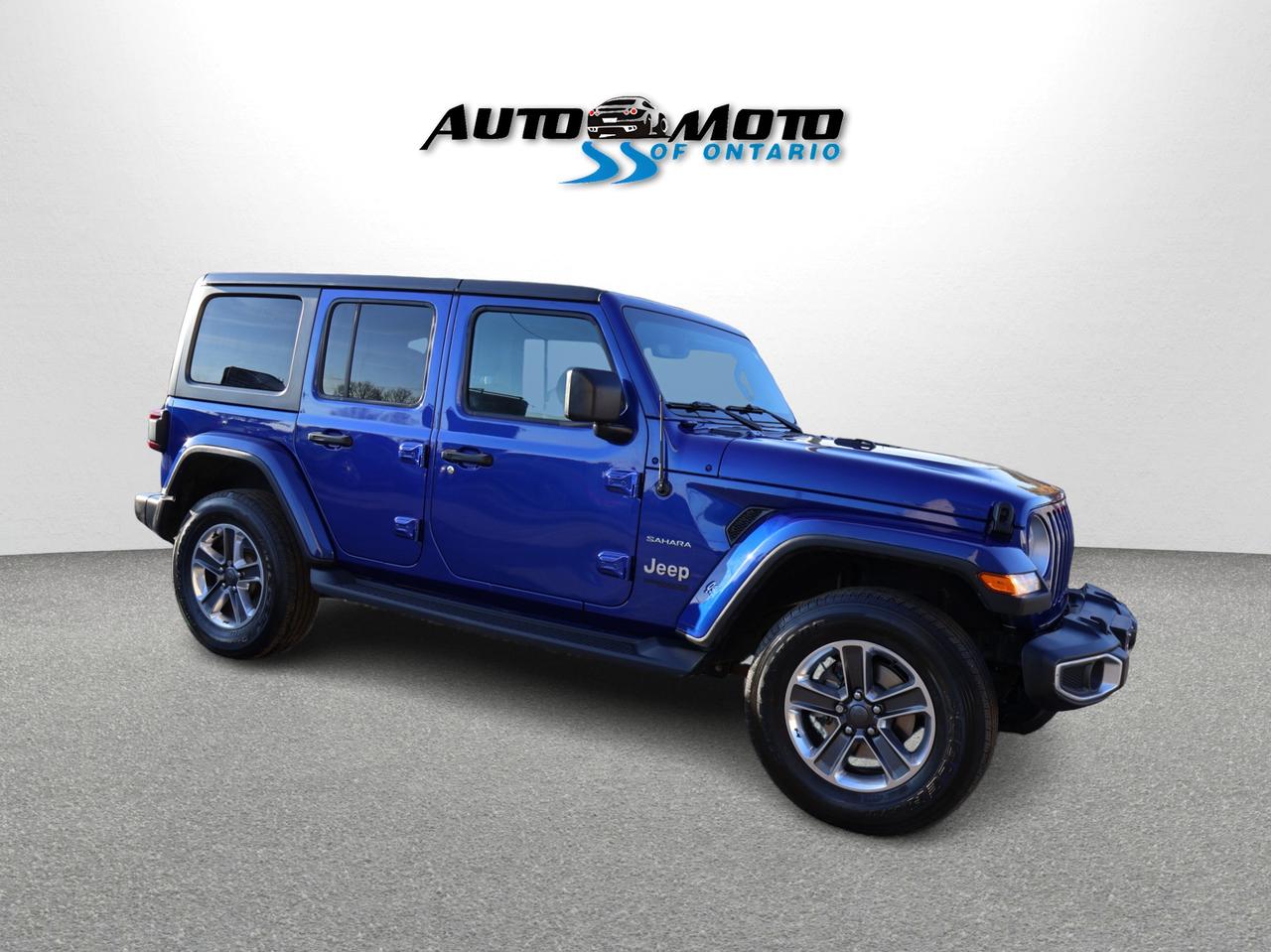 2018 Jeep Wrangler JK UNLIMITED SAHARA 4WD CERTIFIED *1 OWNER*ACCIDENT FREE*DODGE MAINTAIN* CAMERA NAV BLUETOOTH HEATED SEATS/STEERING CRUISE ALLOYS Photo